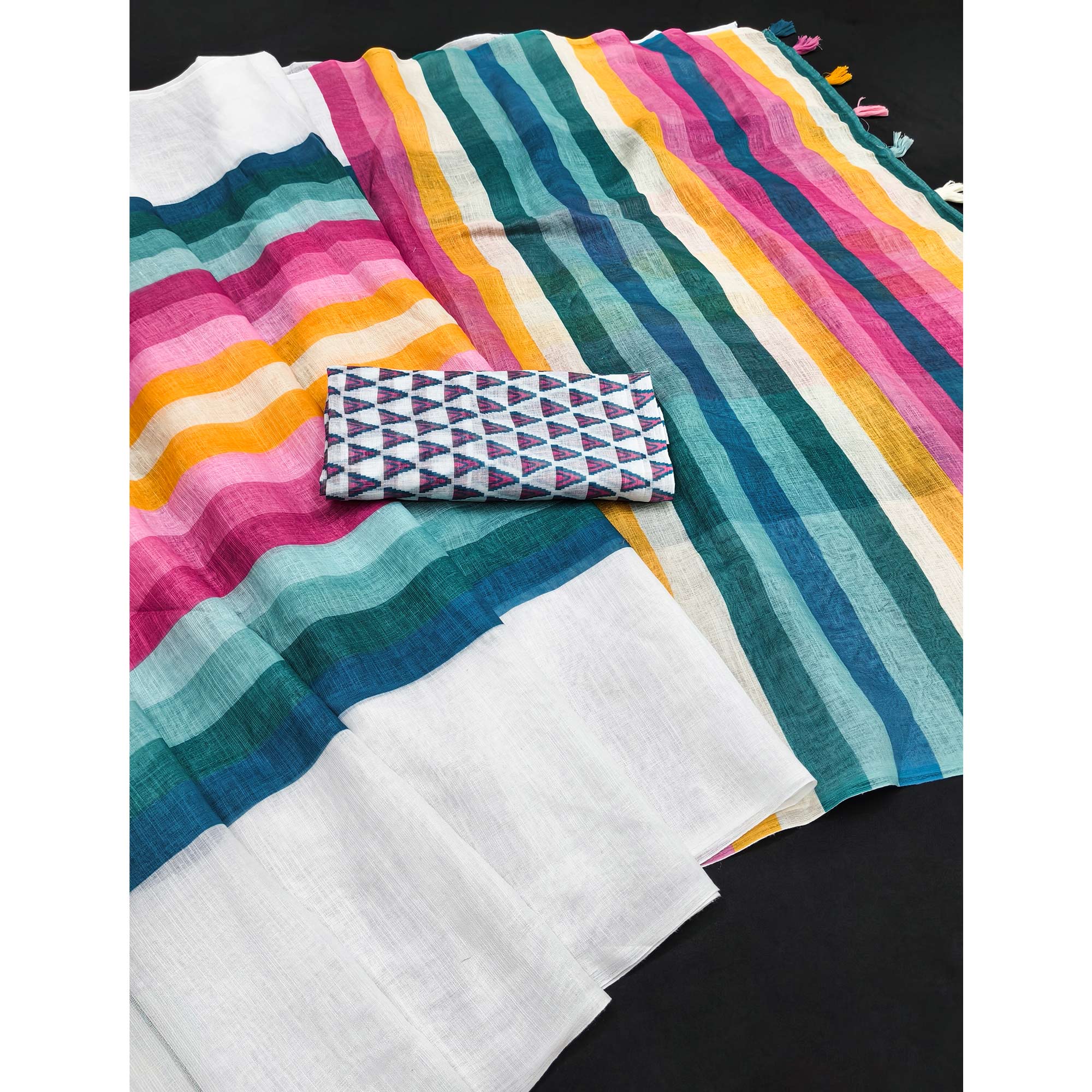 White Linen Saree Designed with Modern Striped Prints and Trendy Tassel Detailing