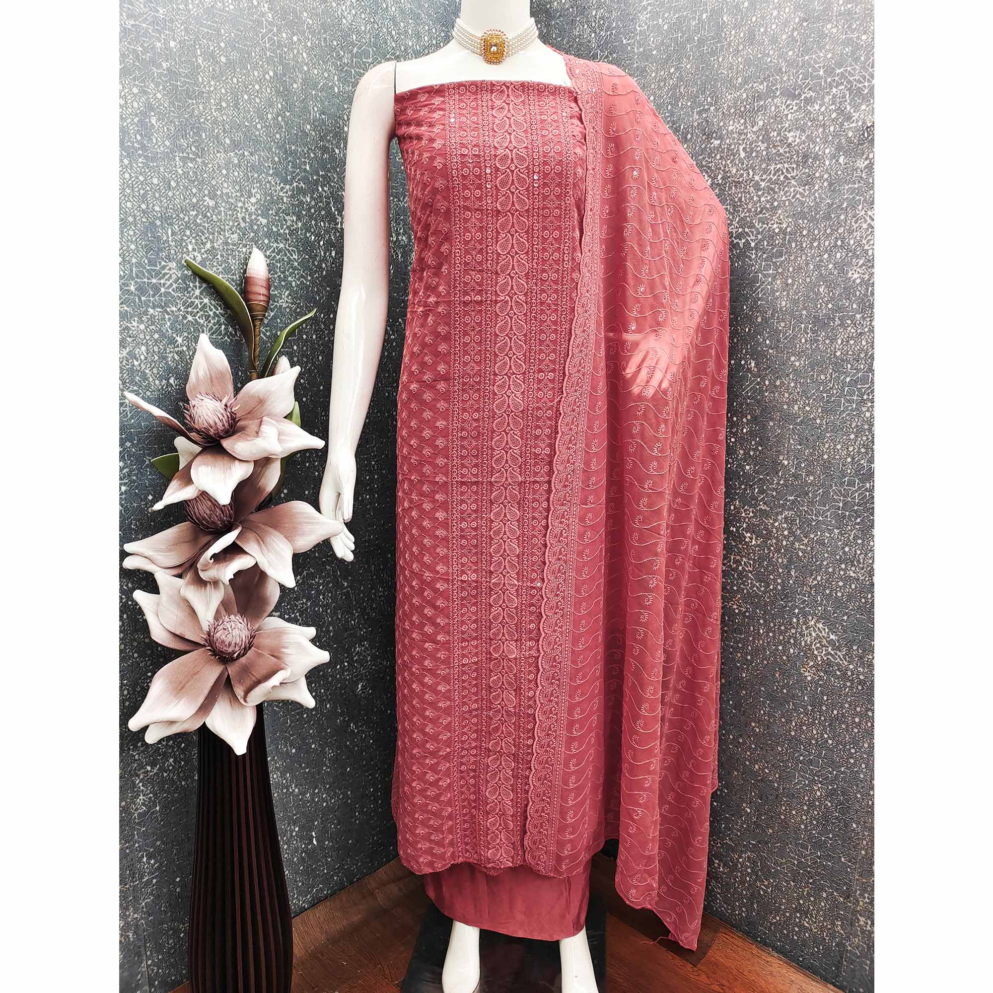 Lightweight Peach Georgette Dress Material Adorned with Beautiful Floral Embroidery