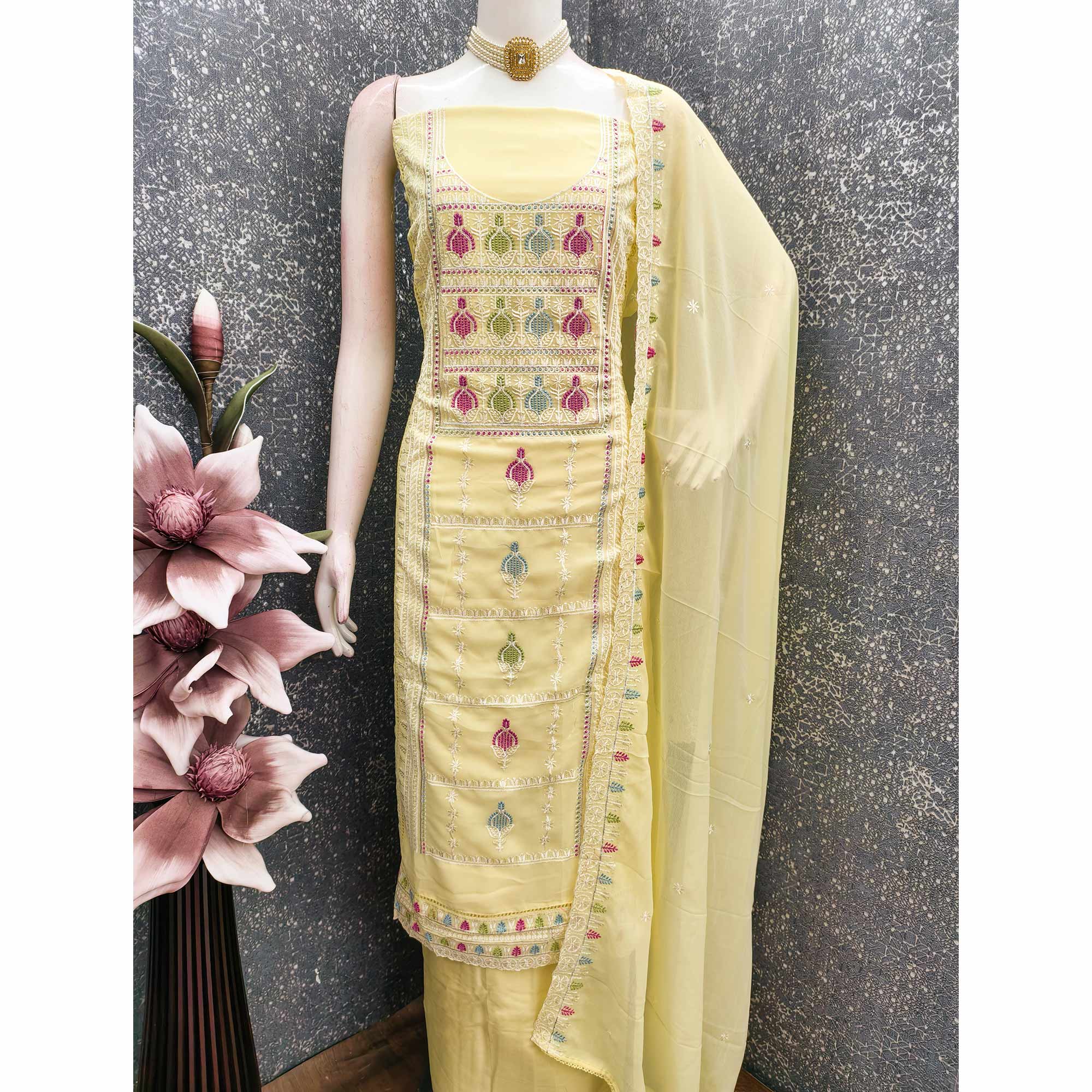 Sophisticated Yellow Georgette Dress Material Accented With Ornate Floral Thread Embroidery