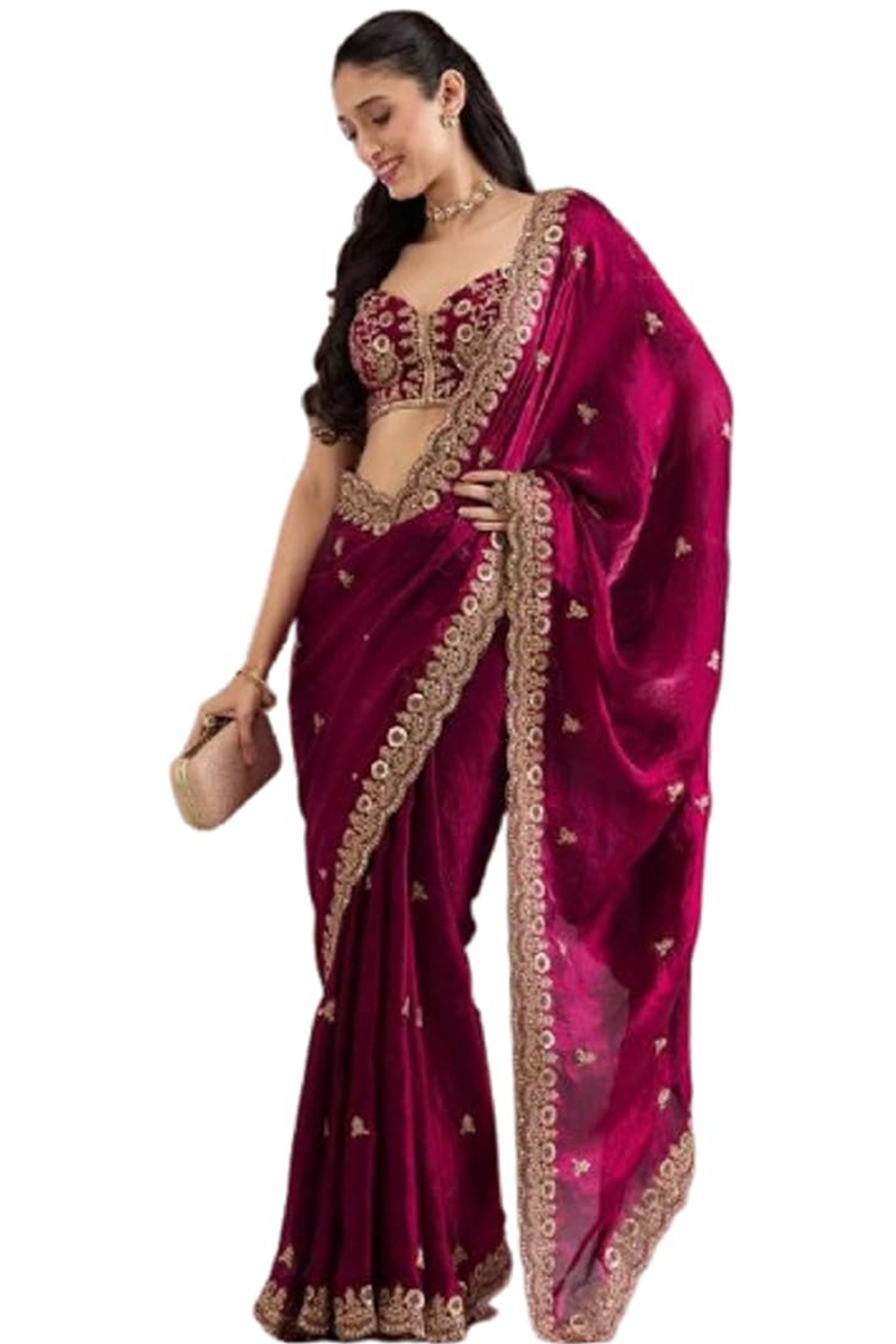 Trendy Rani Pink Fancy Satin Saree Enhanced With Rich Golden Embroidered Design
