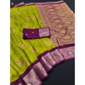Festive Light Green Dola Silk Saree Enhanced with Ornate Zari Weaving