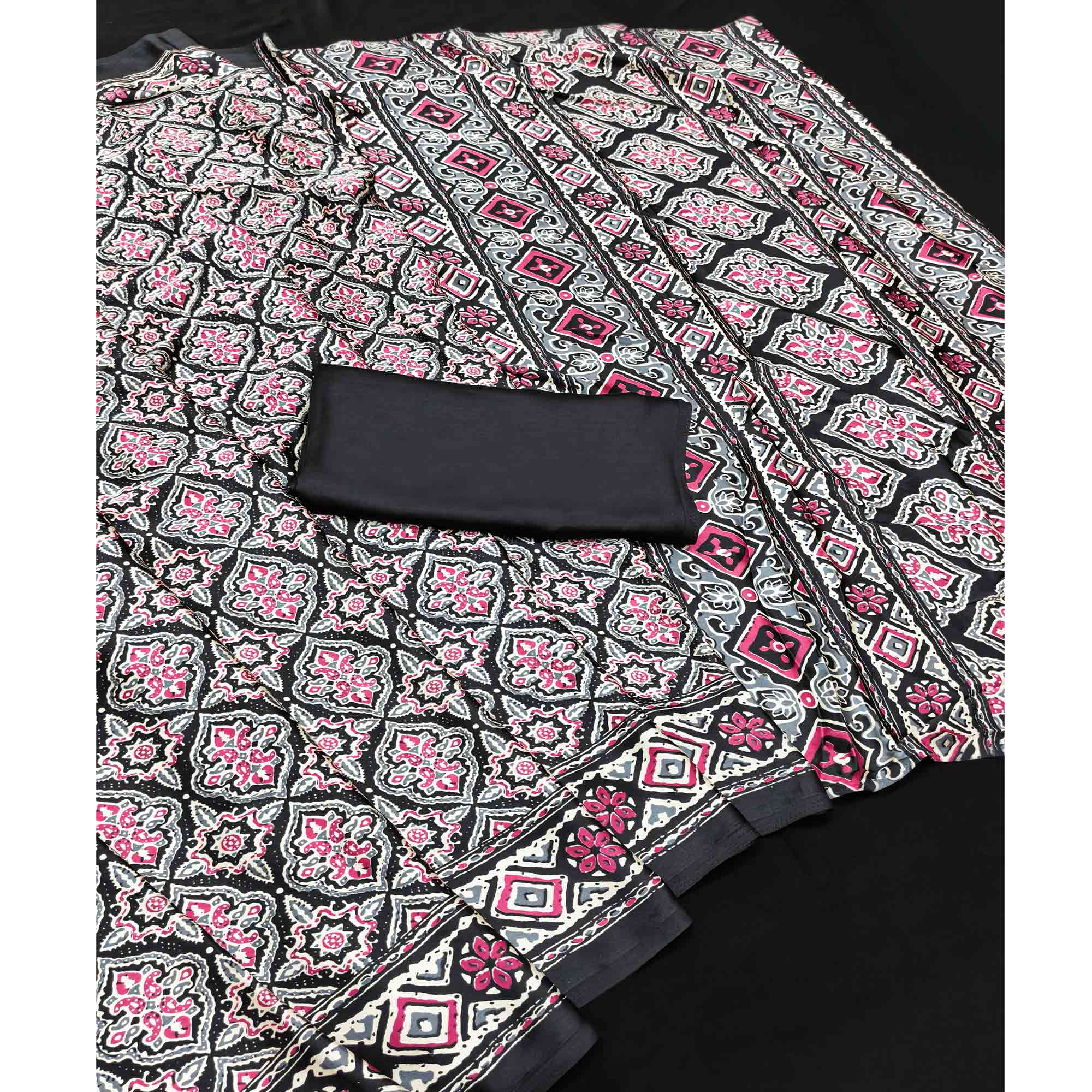 Charming Black Mill Printed Crepe Silk Saree Adorned With Vibrant Floral Design