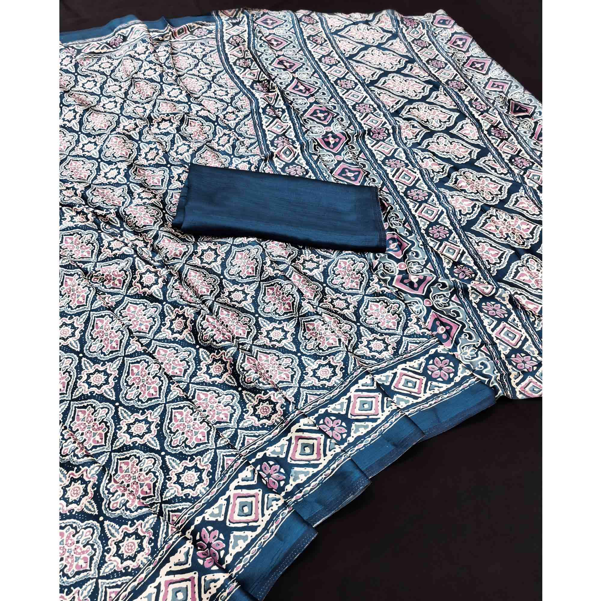 Charming Morpich Blue Mill Printed Crepe Silk Saree Adorned With Vibrant Floral Design