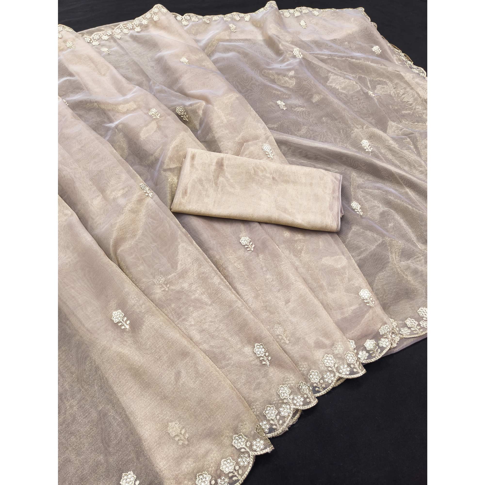 Beige Net Partywear Saree Featuring Fine Floral Embroidery and a Soft, Flowing Look