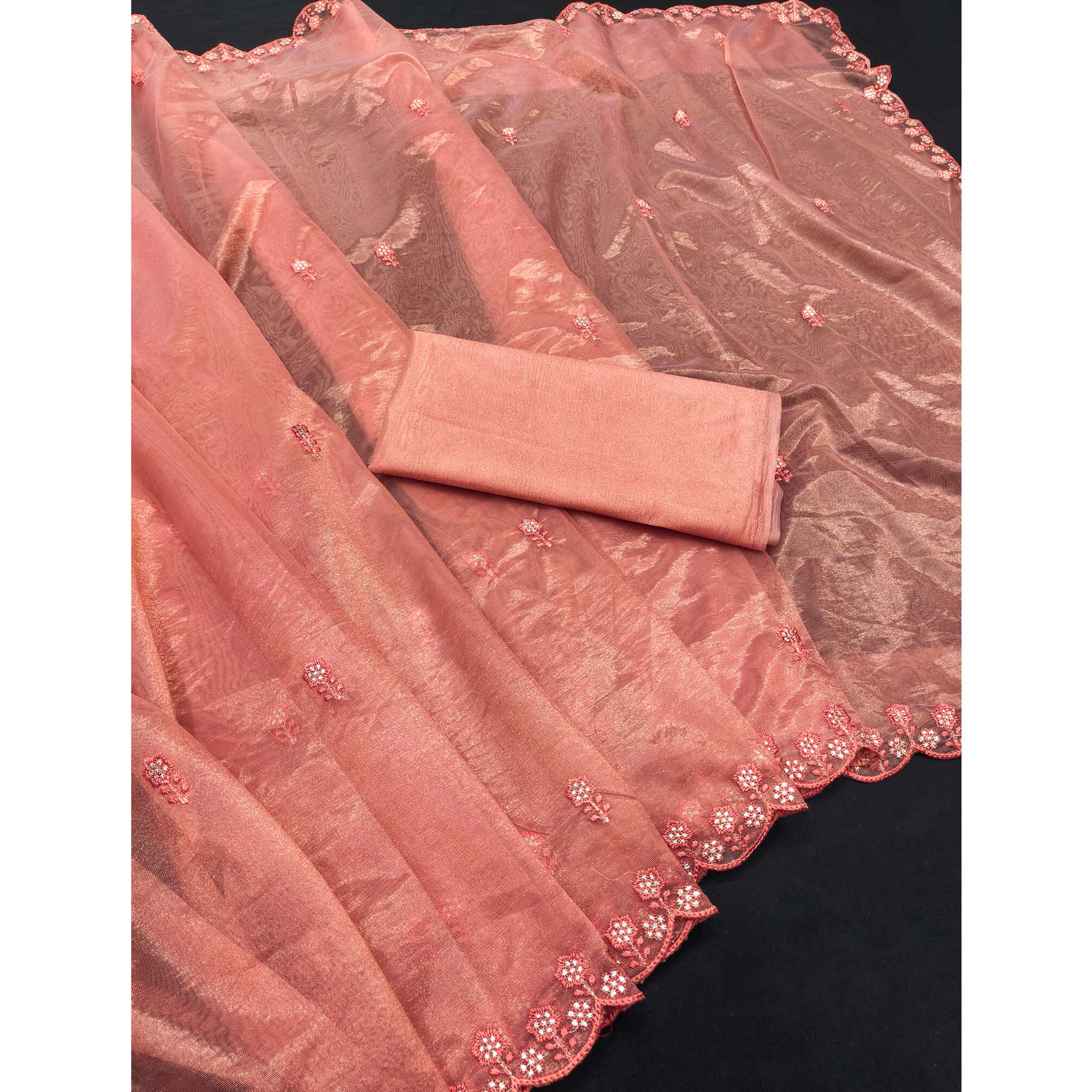 Peach Net Partywear Saree Featuring Fine Floral Embroidery and a Soft, Flowing Look