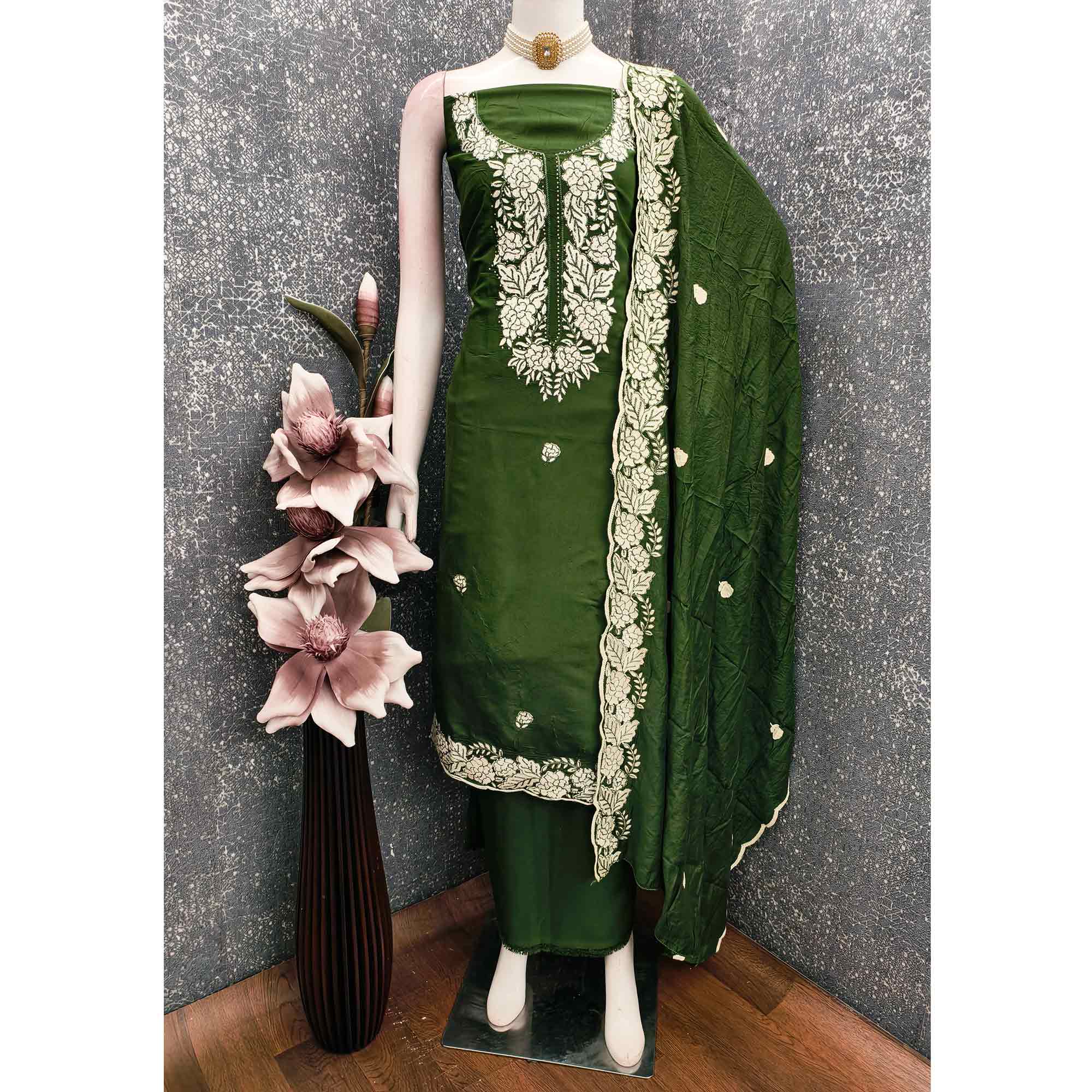 Bottle Green Rich Viscose Dress Material Highlighted with Refined Floral Thread Embroidery