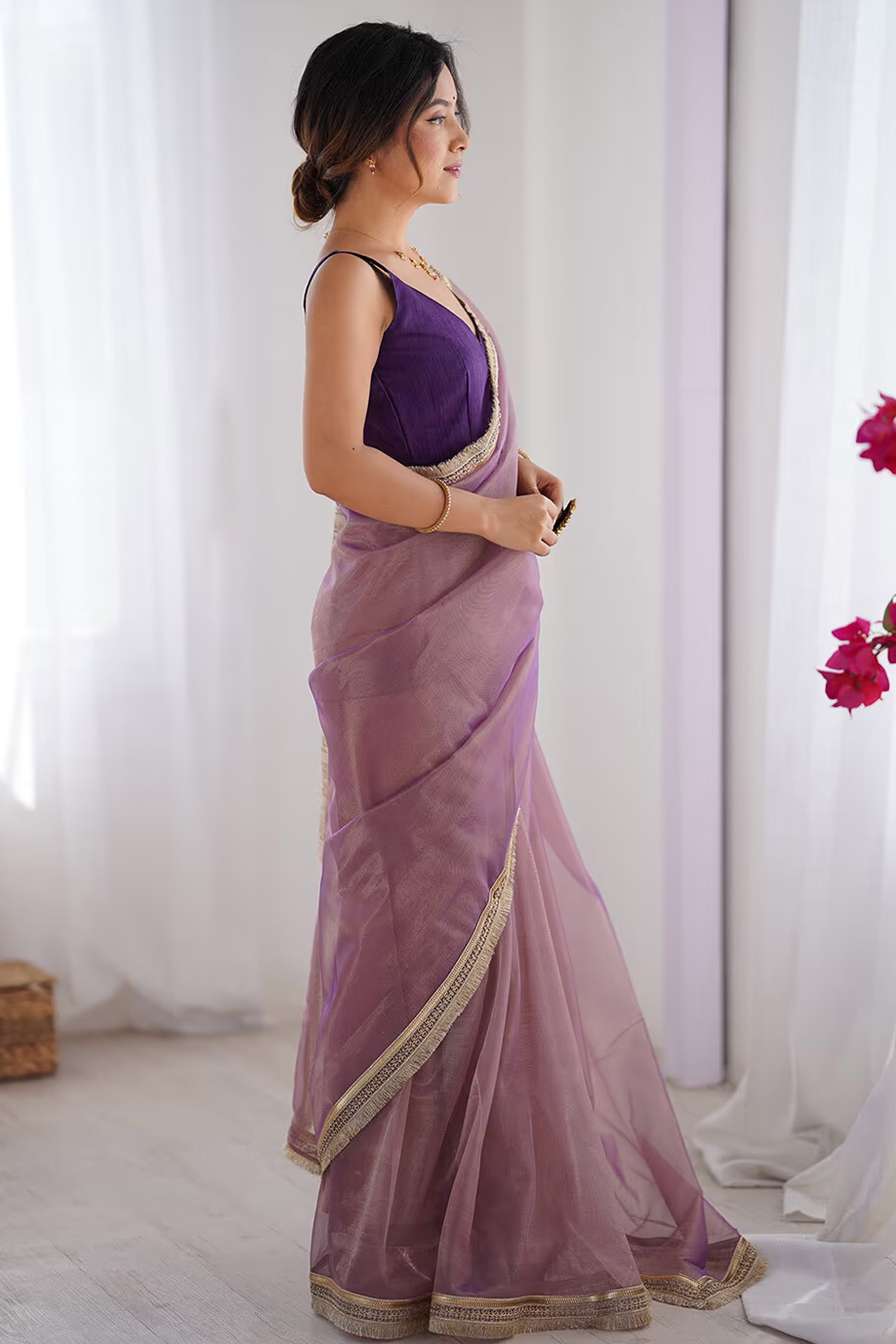 Purple Solid Pattern Net Saree with Refined Lace Work for Parties