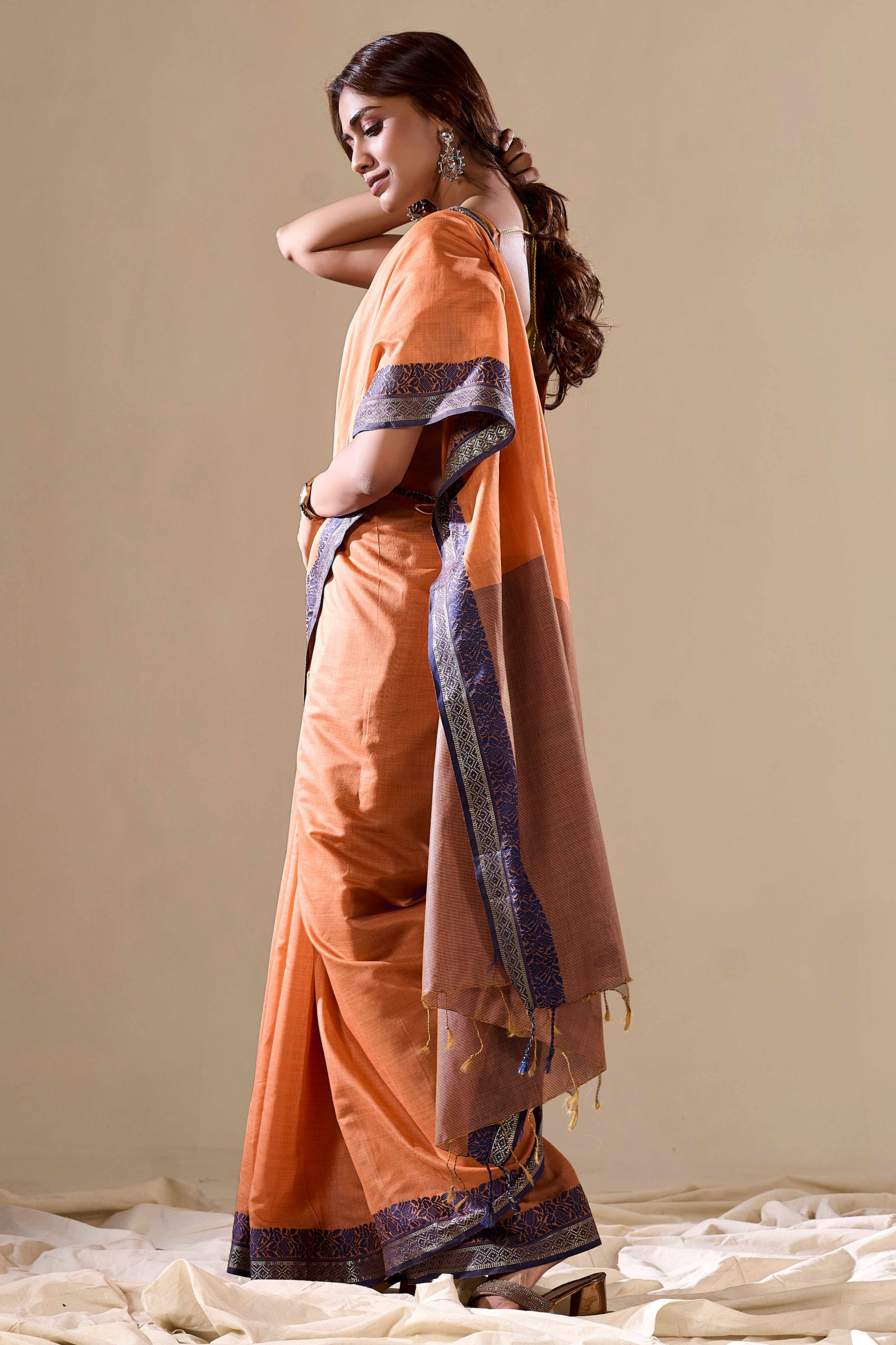 Orange Khaadi Saree with Elegant Solid Body and Contrast Weaving Border