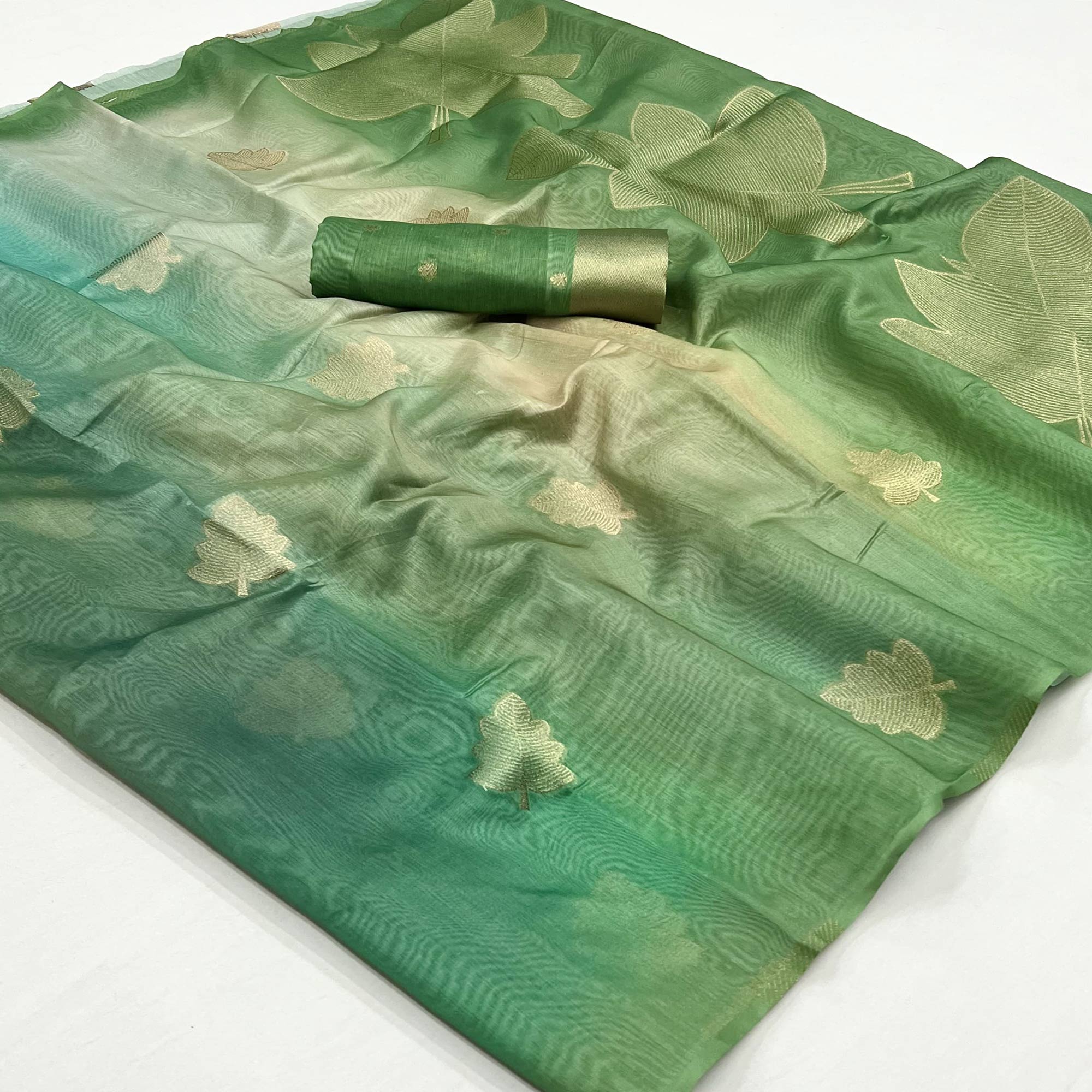 Green Silk Blend Saree With Intricate Zari Leaf Motifs