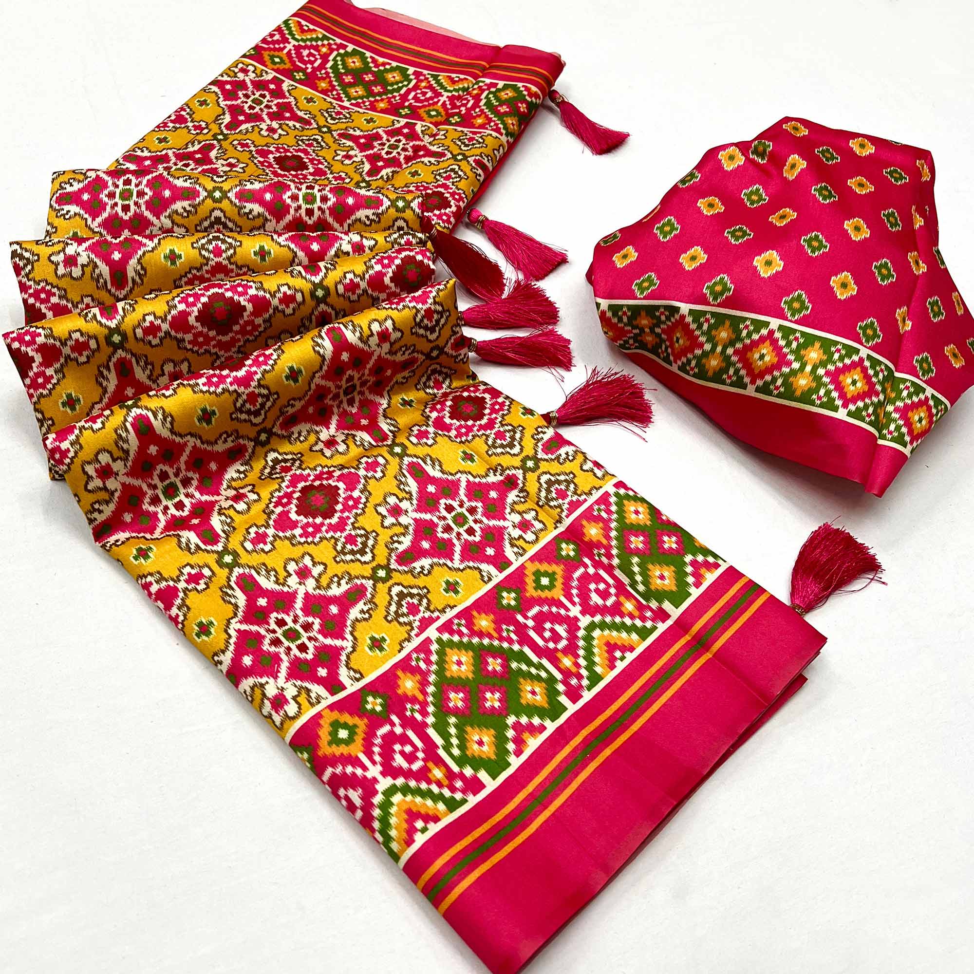 Yellow & Pink Patola Printed Tussar Silk Saree With Tassels