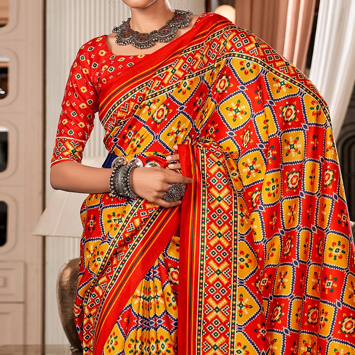 Red & Yellow Patola Printed Tussar Silk Saree