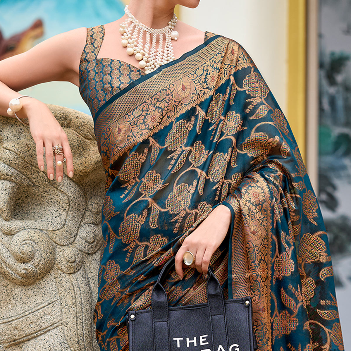 Teal Floral Motifs Woven Organza Saree