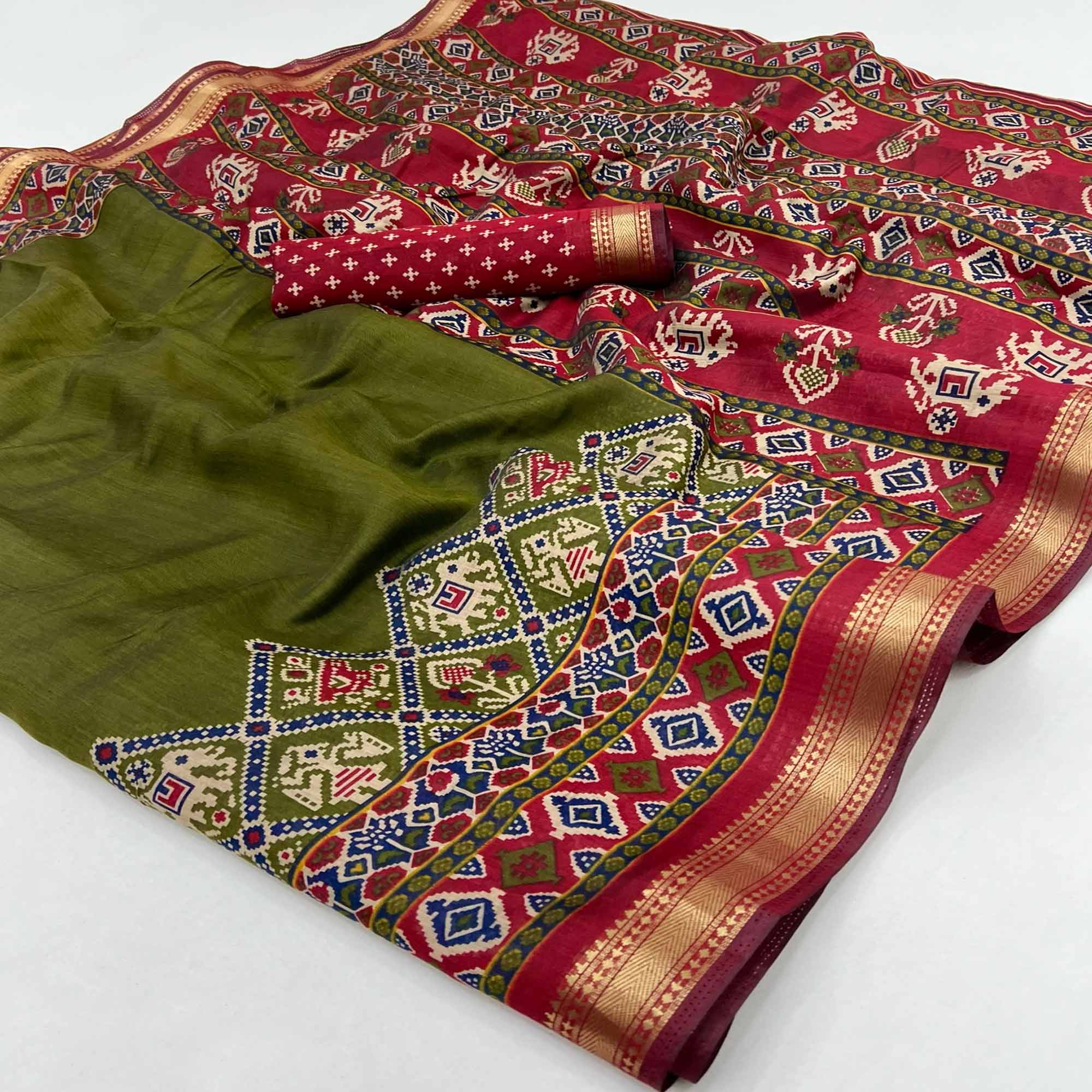 Green Patola Print Saree in Featherlight Mulmul Cotton with Zari Border