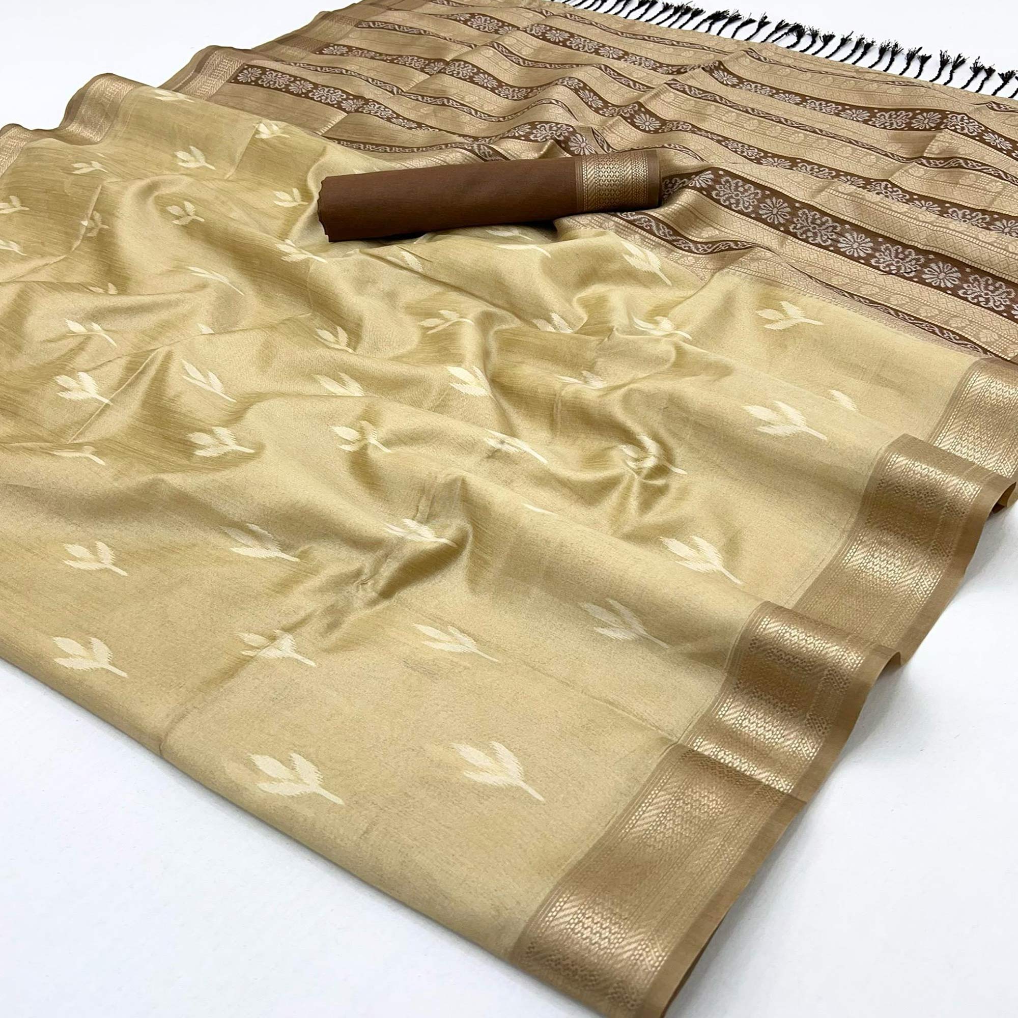 Beige Ikkat Style Rayon Silk Saree with Luxurious Zari Border and Delicate Tassels