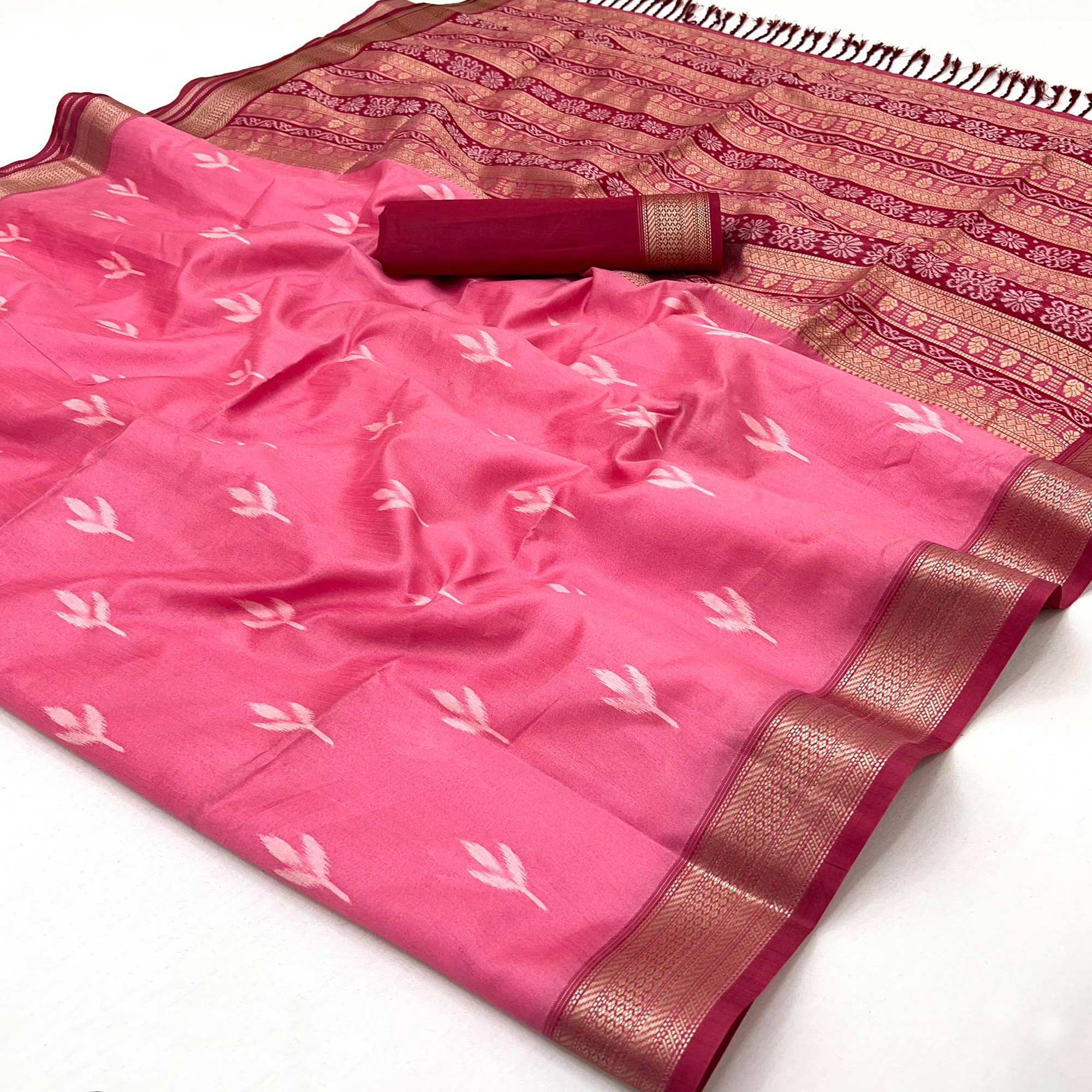 Gajri Pink Ikkat Style Rayon Silk Saree with Luxurious Zari Border and Delicate Tassels