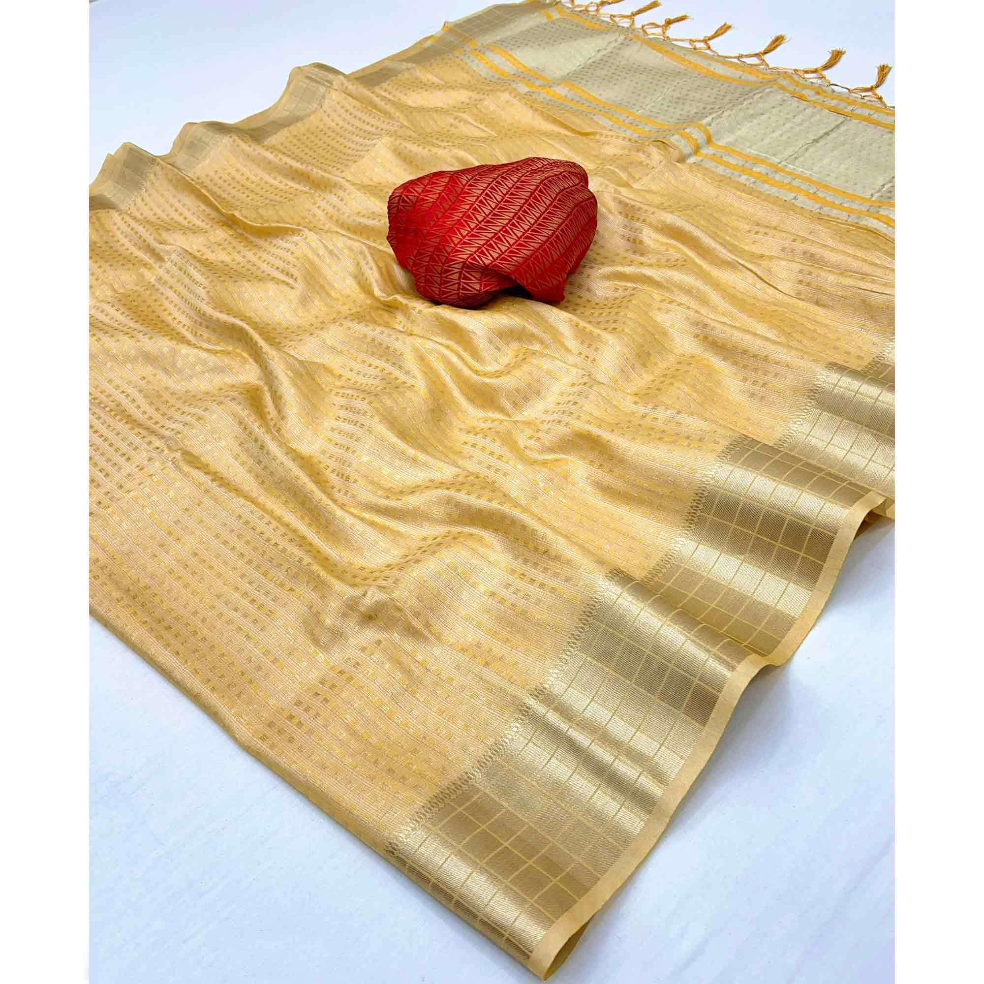 Yellow Soft Tissue Saree Featuring Rich Zari-Woven Detailing.