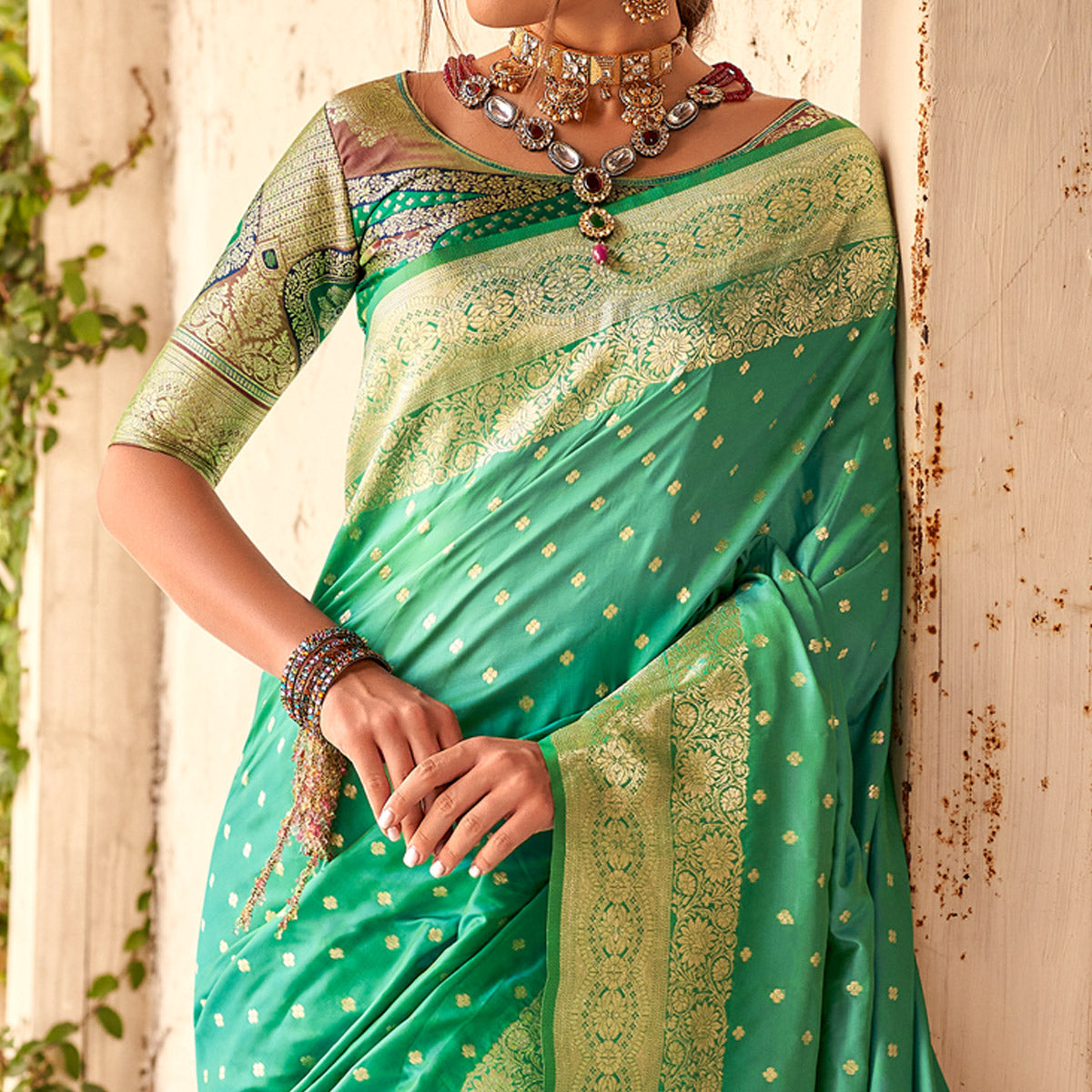 Rama Green Floral Woven Banarasi Silk Saree With Tassels