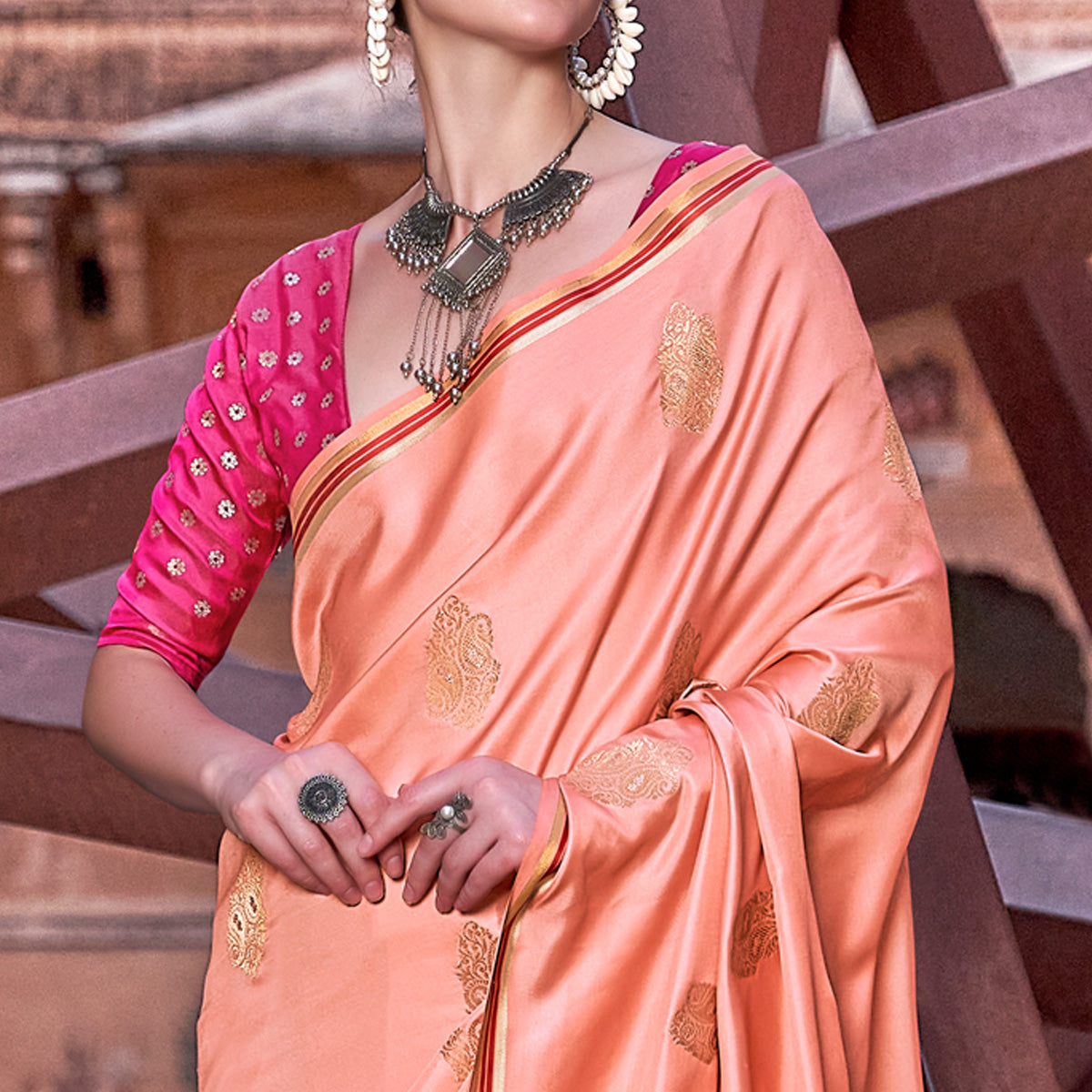Peach Woven Satin Saree With Tassels