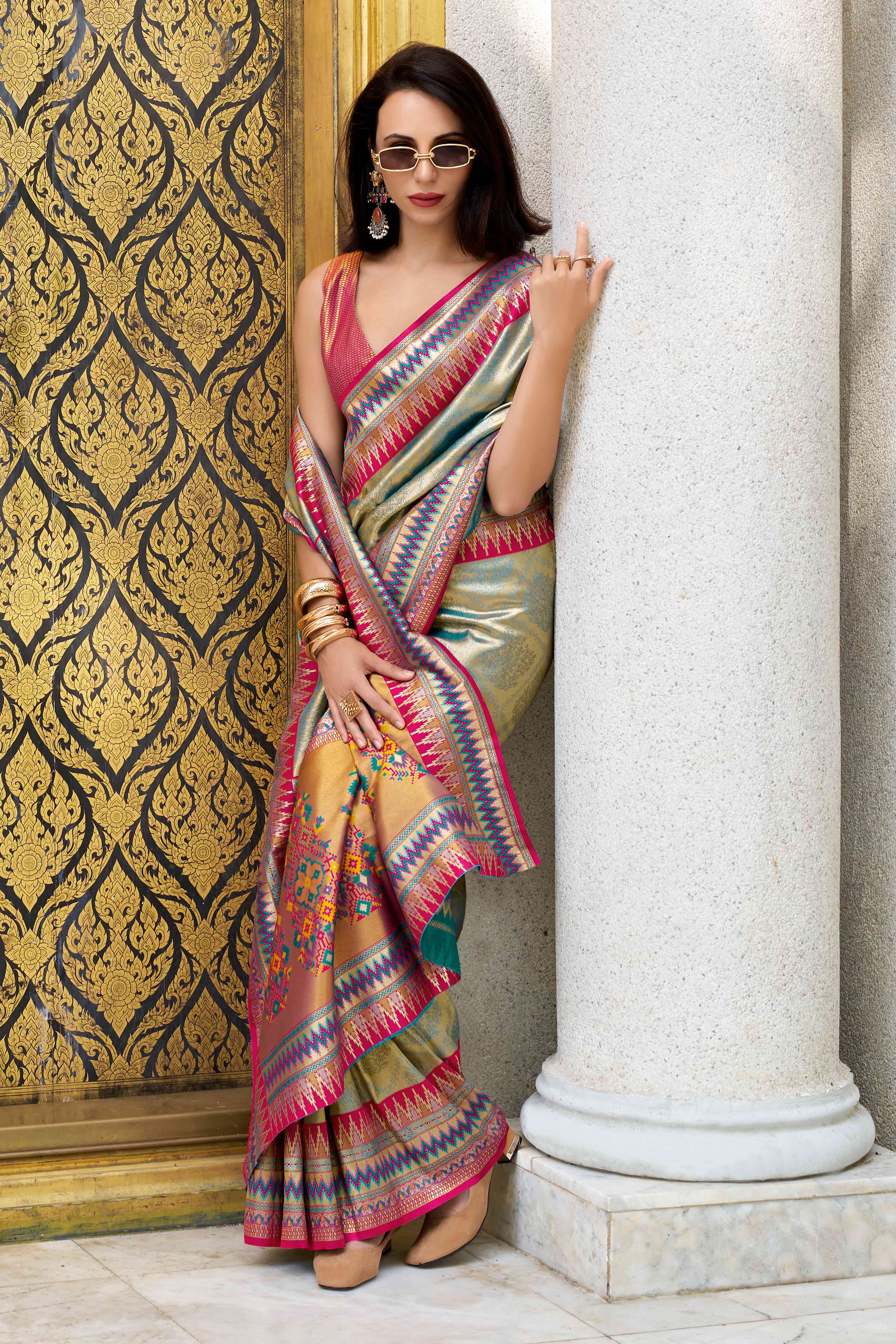 Teal Zari Weaving Tissue Silk Saree
