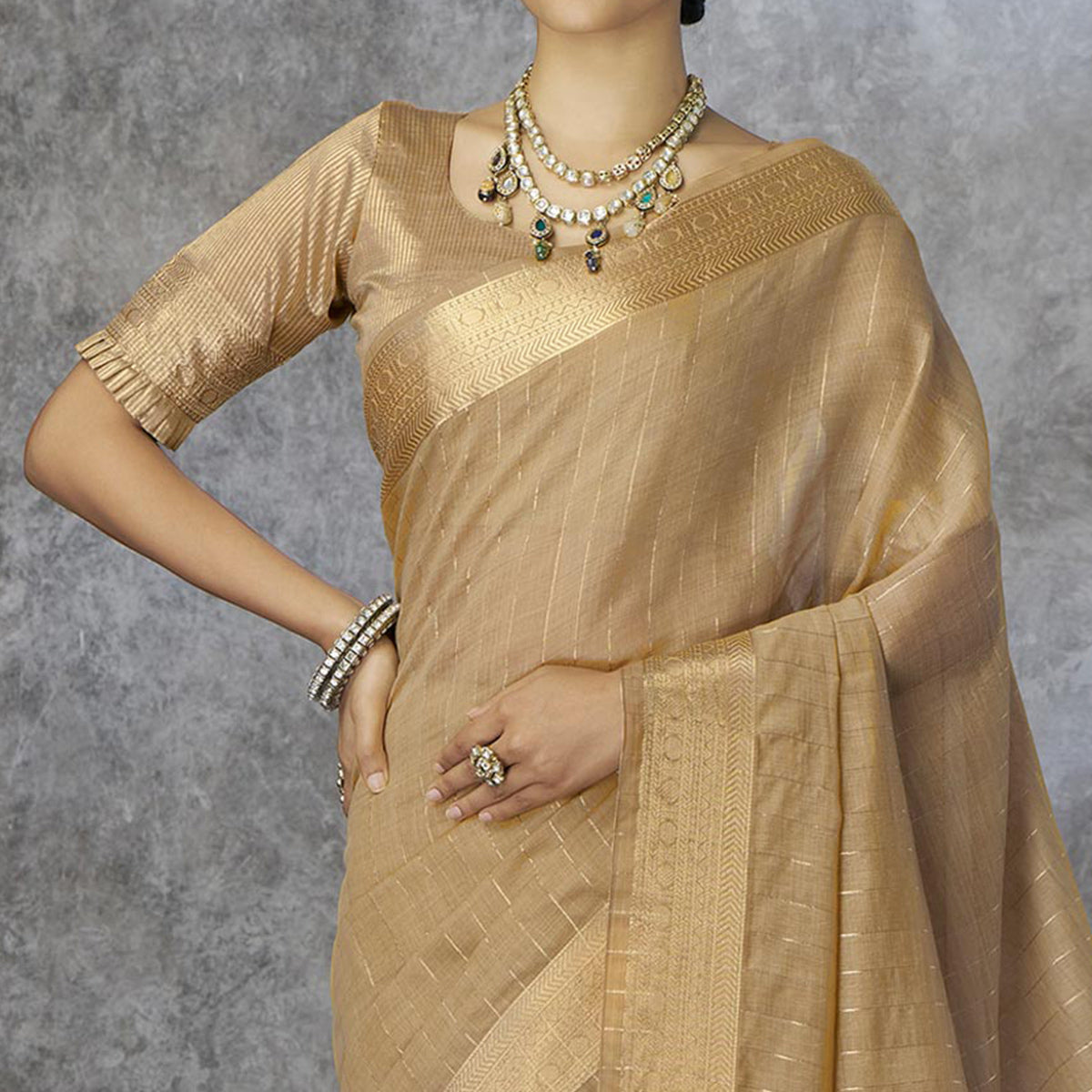 Chikoo Woven Cotton Silk Saree With Tassels