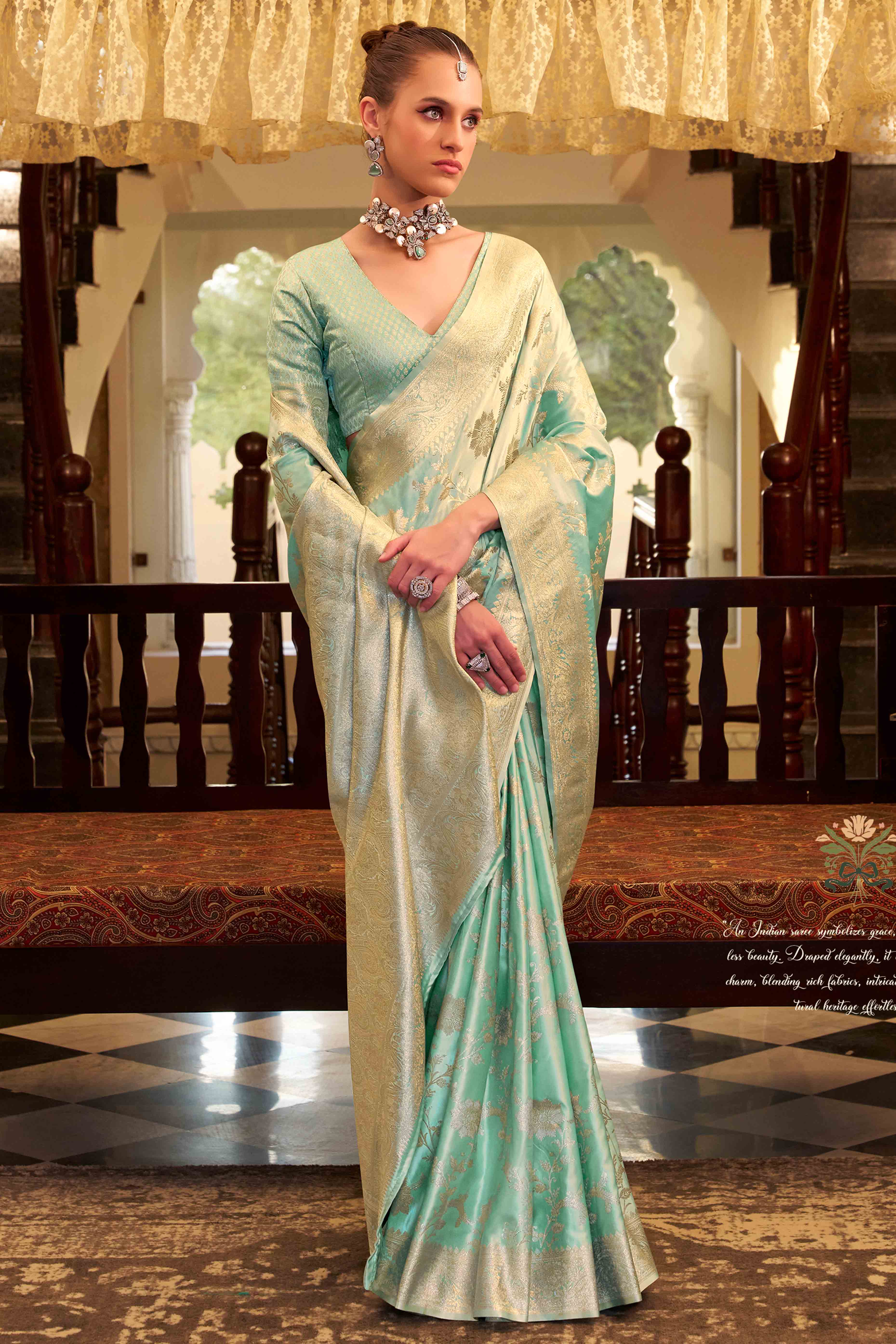 Mint Green Soft Satin Saree Featuring Exquisite Zari Weaving Work