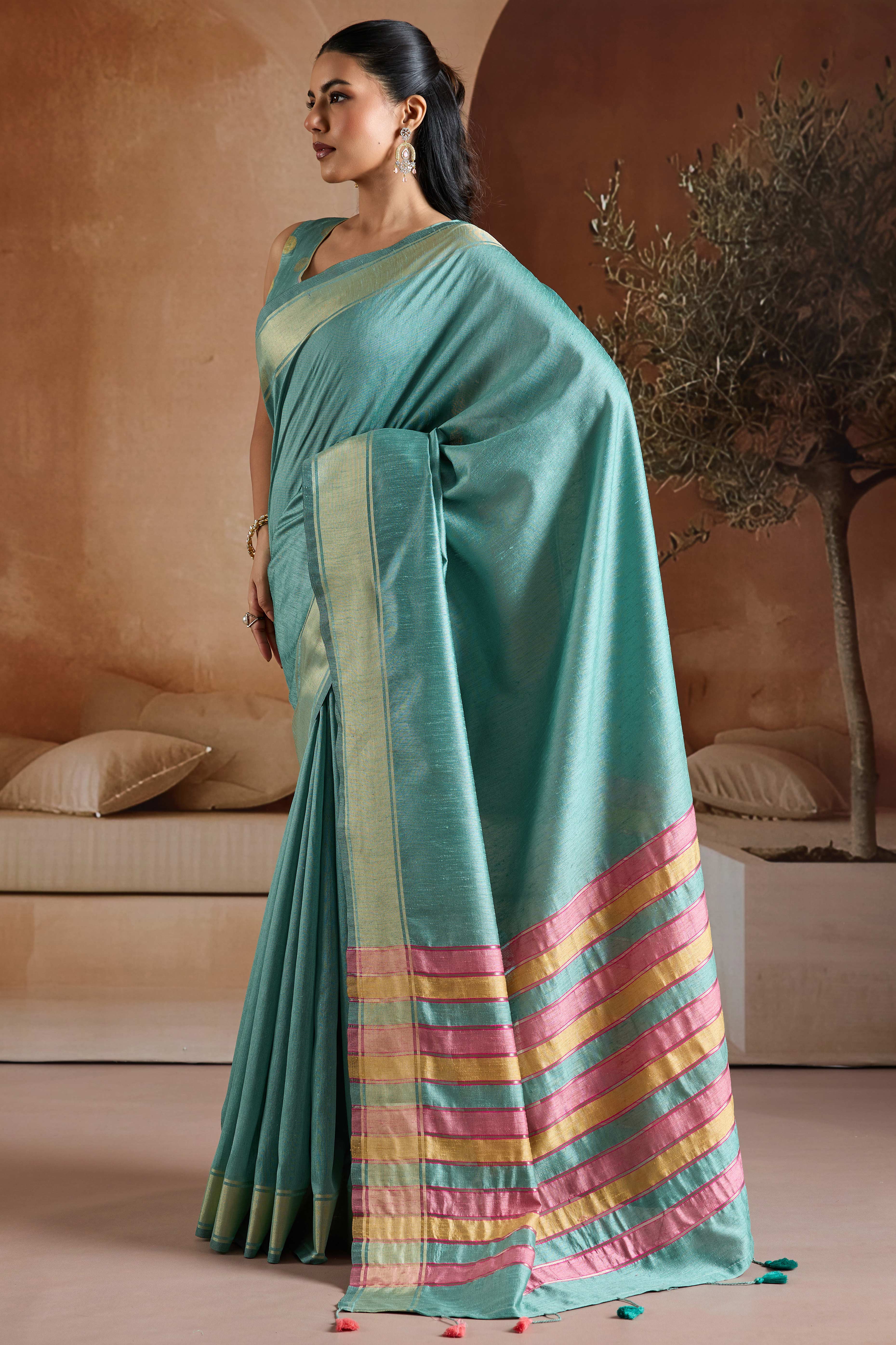 Graceful Turquoise Zari Woven Bhagalpuri Silk Saree Accented With Tassel Pallu