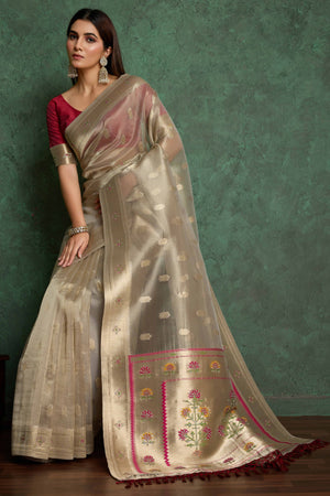 Elegant Beige Floral Woven Tissue Saree Adorned With Shimmering Jarkan Work & Tassel Pallu