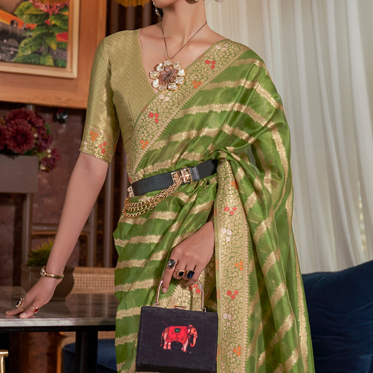 Green Woven Organza Saree With Tassels