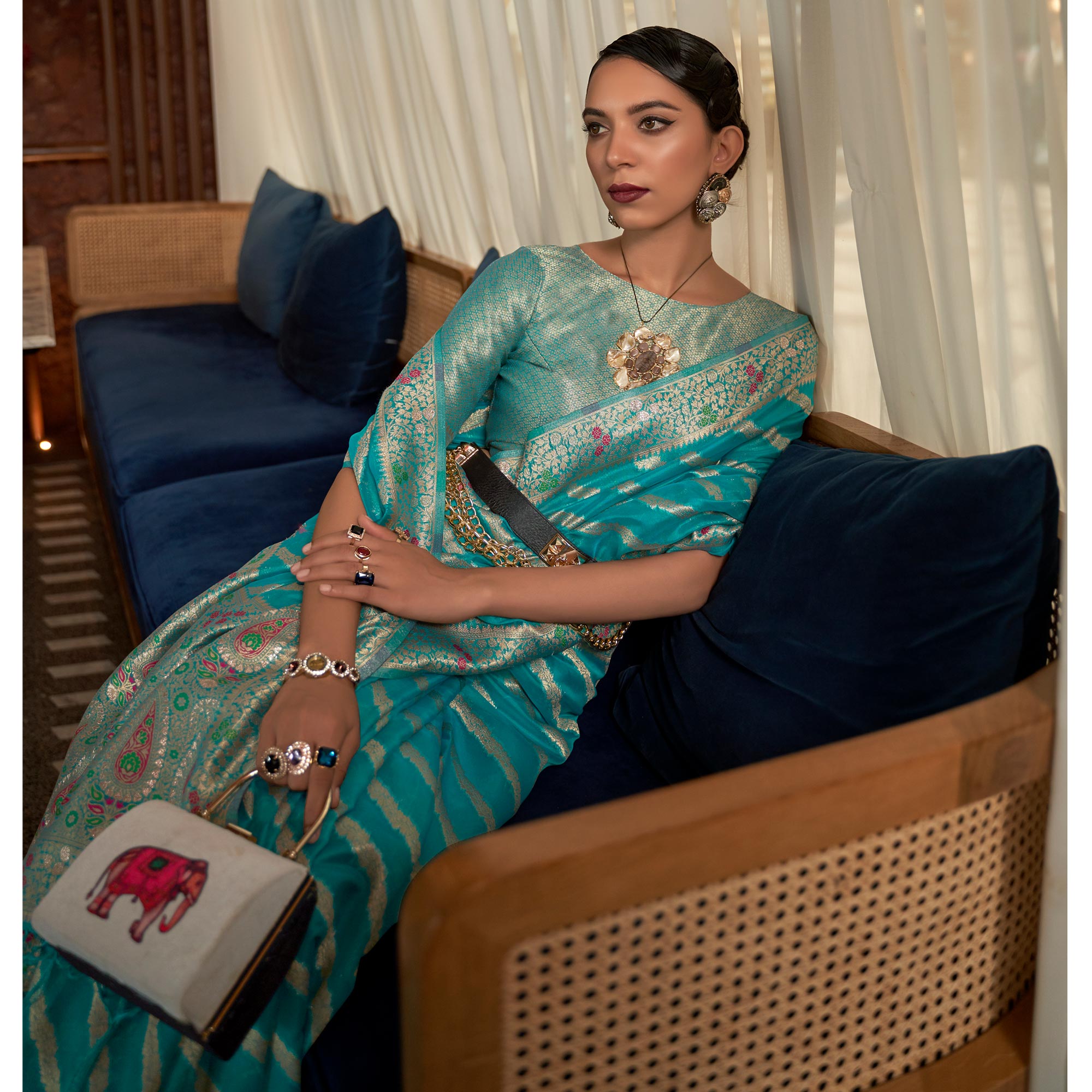 Rama Blue Woven Organza Saree With Tassels