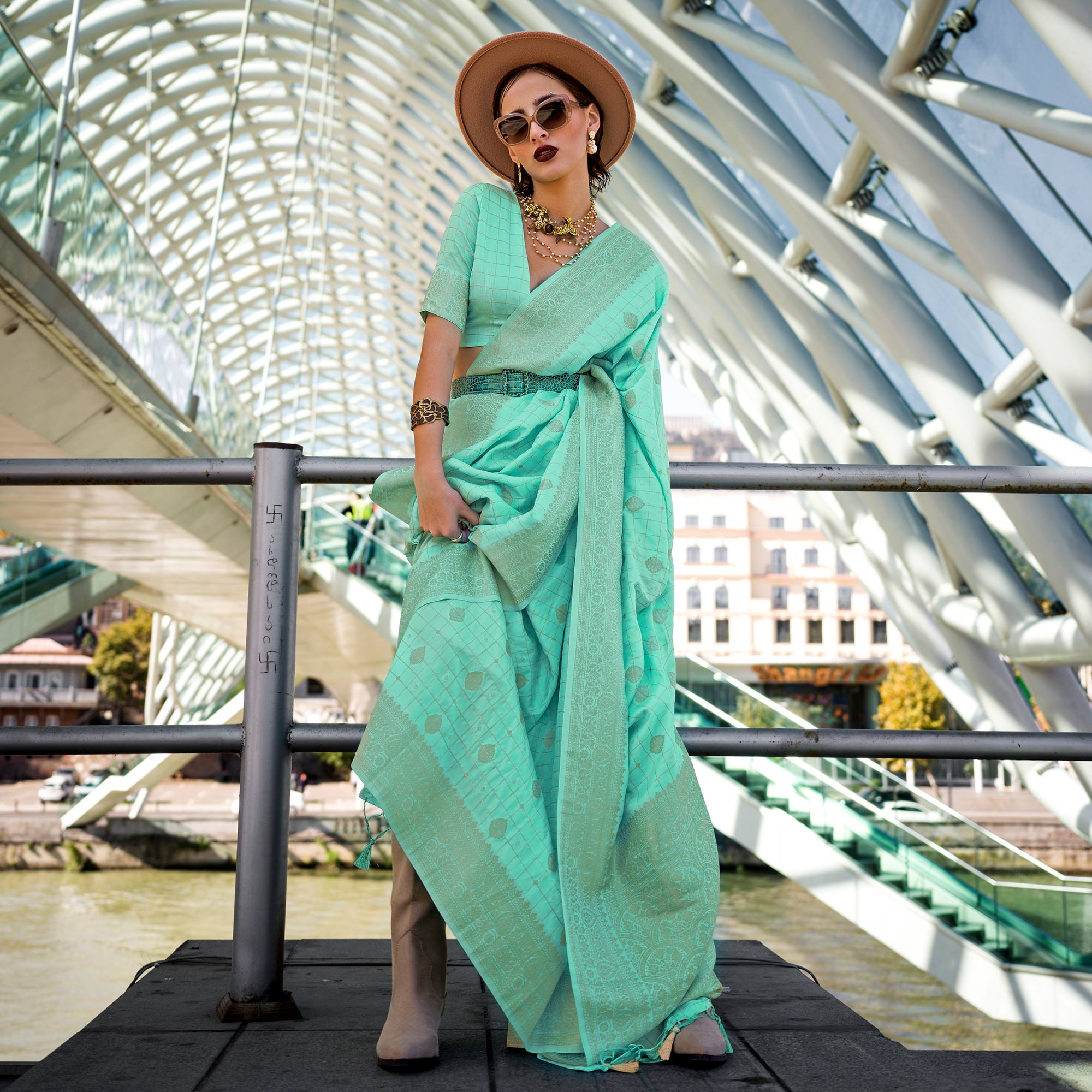 Turquoise Woven Art Silk Saree With Tassels