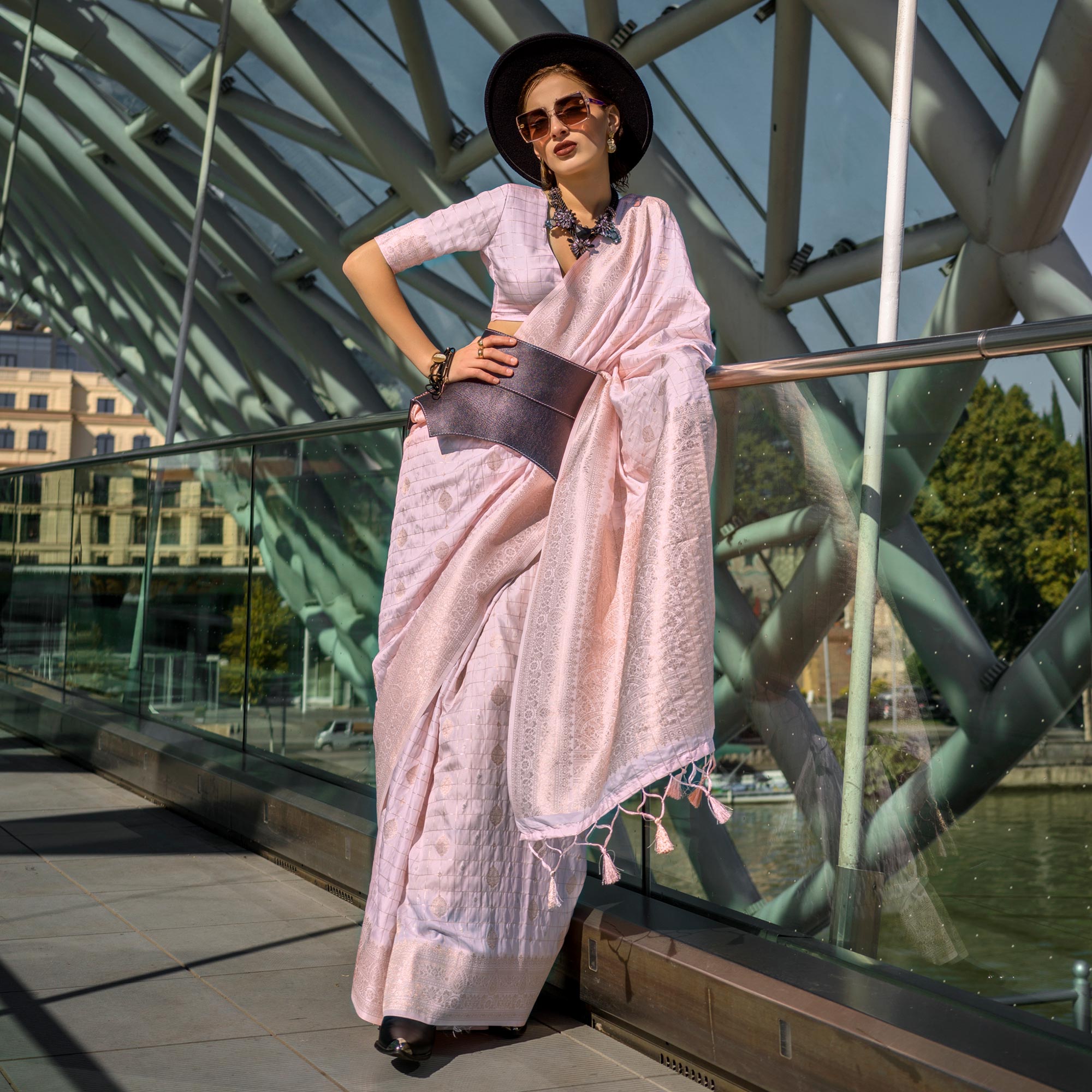 Baby Pink Woven Art Silk Saree With Tassels