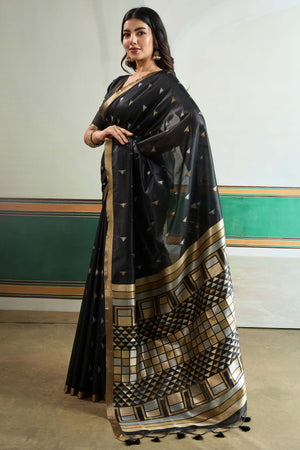 Classic Black Tussar Silk Saree Showcasing Rich Geometric Weaving & Trendy Tassel Pallu
