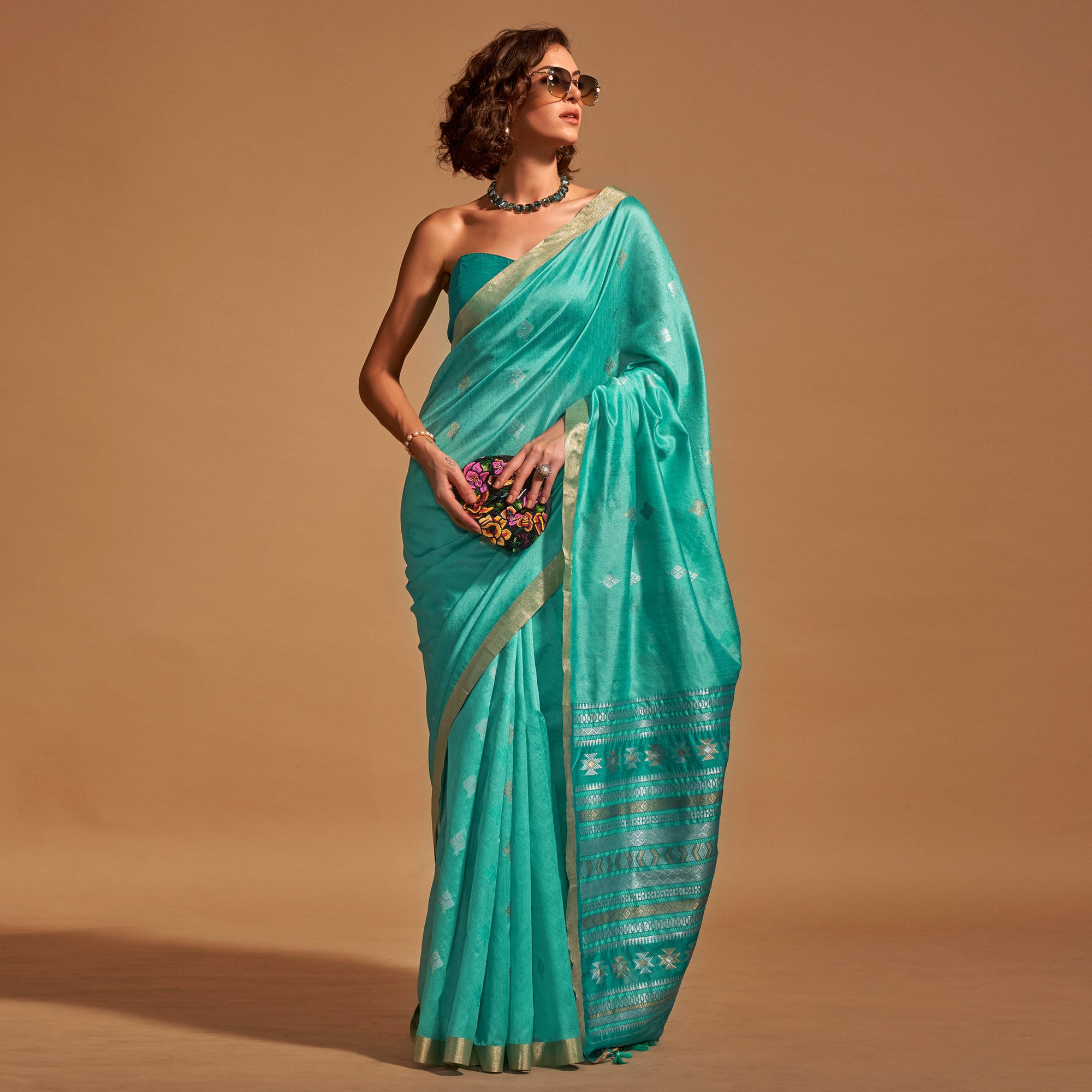 Turquoise Woven Art Silk Saree With Tassels