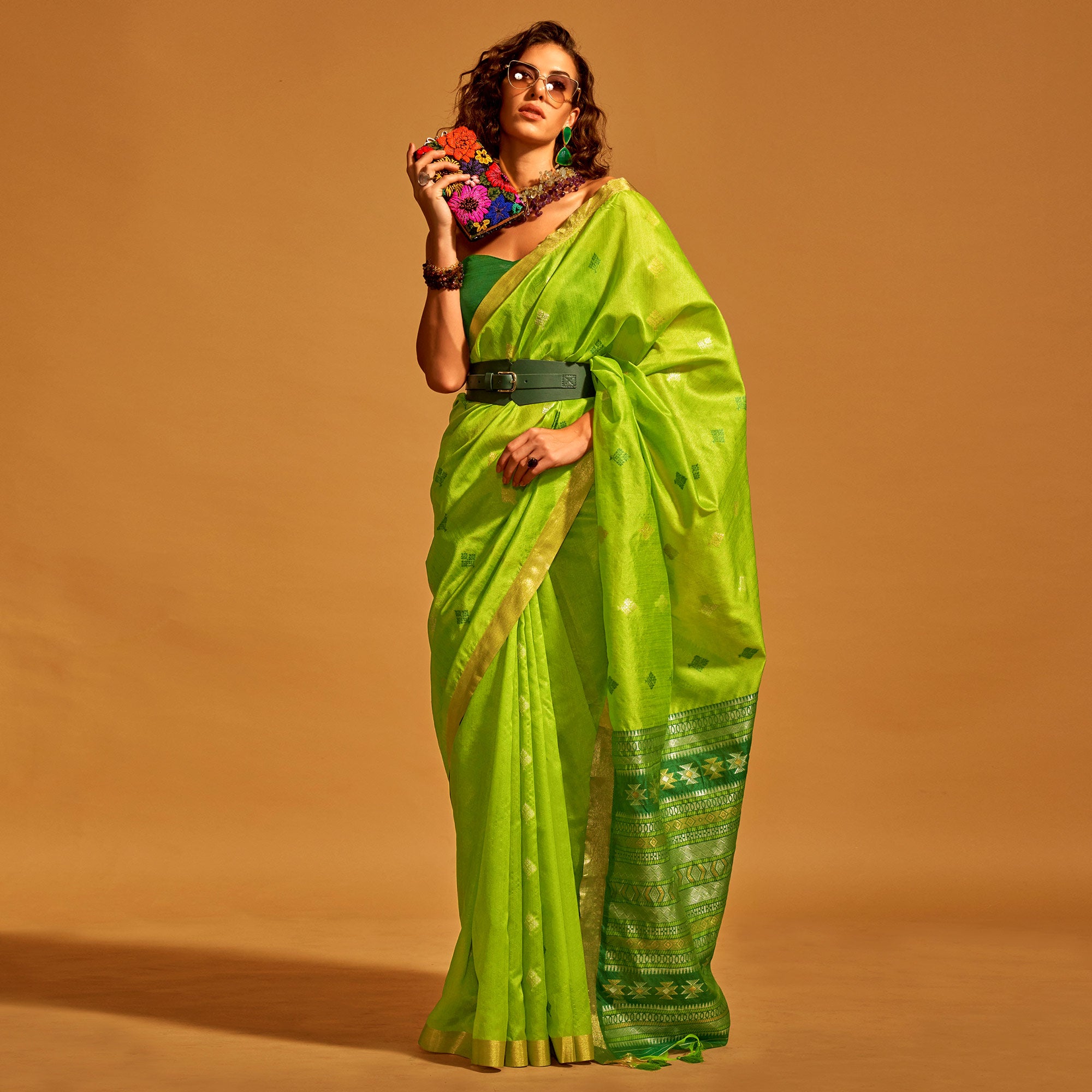 Green Woven Art Silk Saree With Tassels