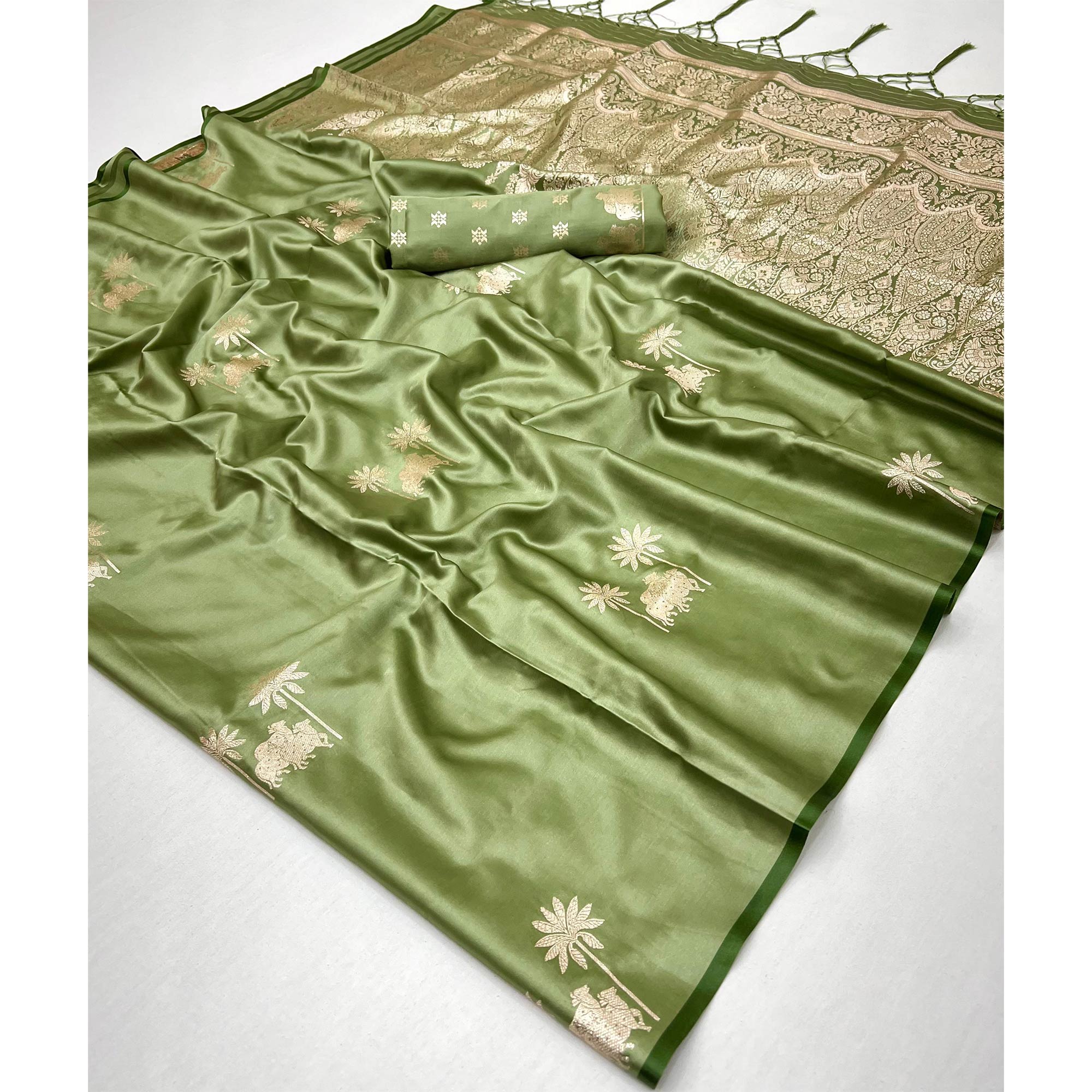 Green Satin Silk Saree with Exquisite Floral Zari Weaving & Graceful Tassel Detailing