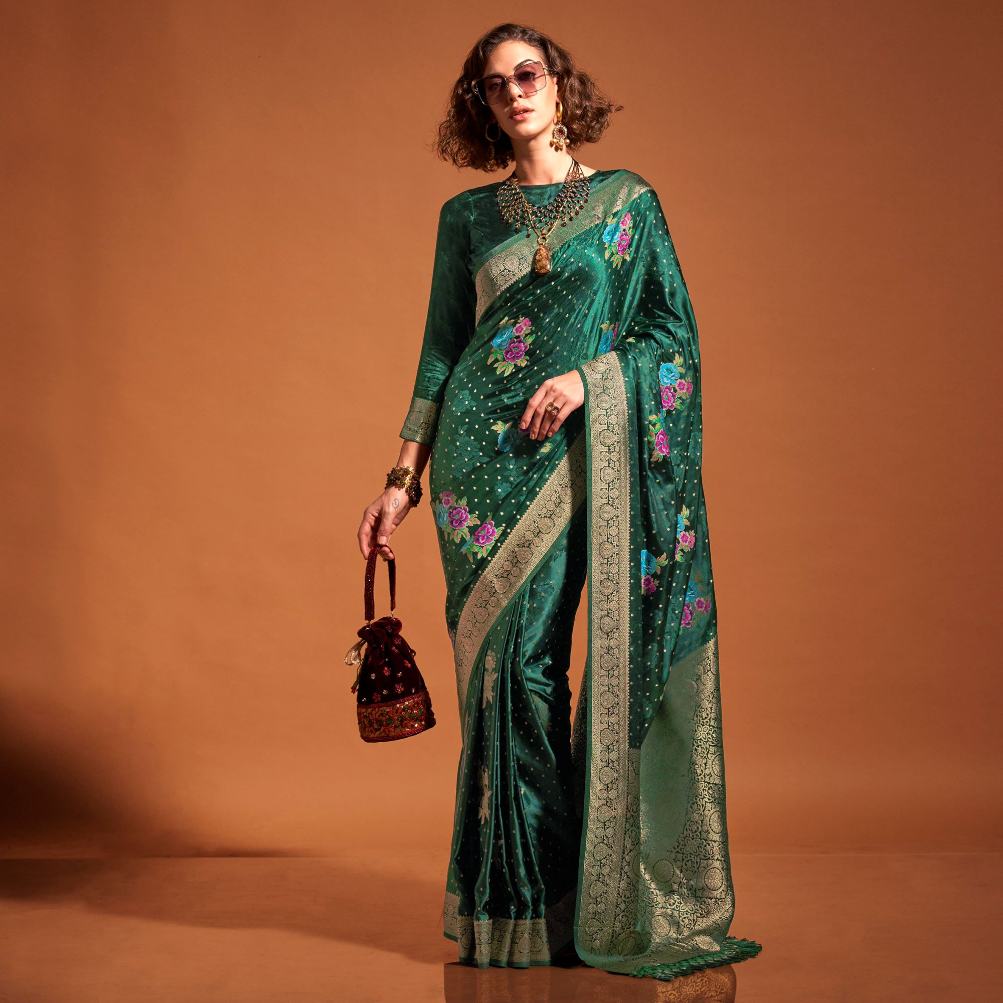Green Floral Woven Satin Saree With Tassels