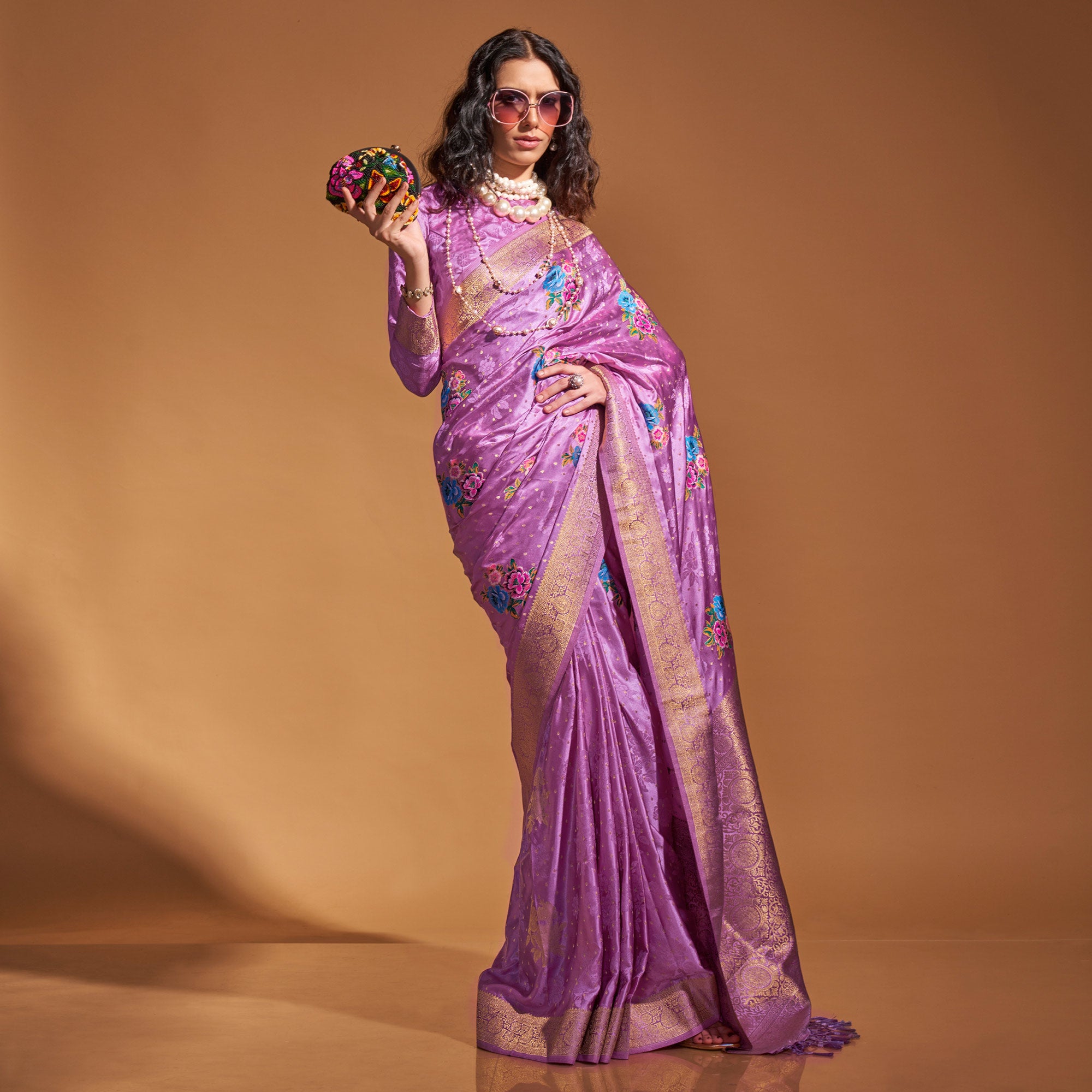 Purple Floral Woven Satin Saree With Tassels