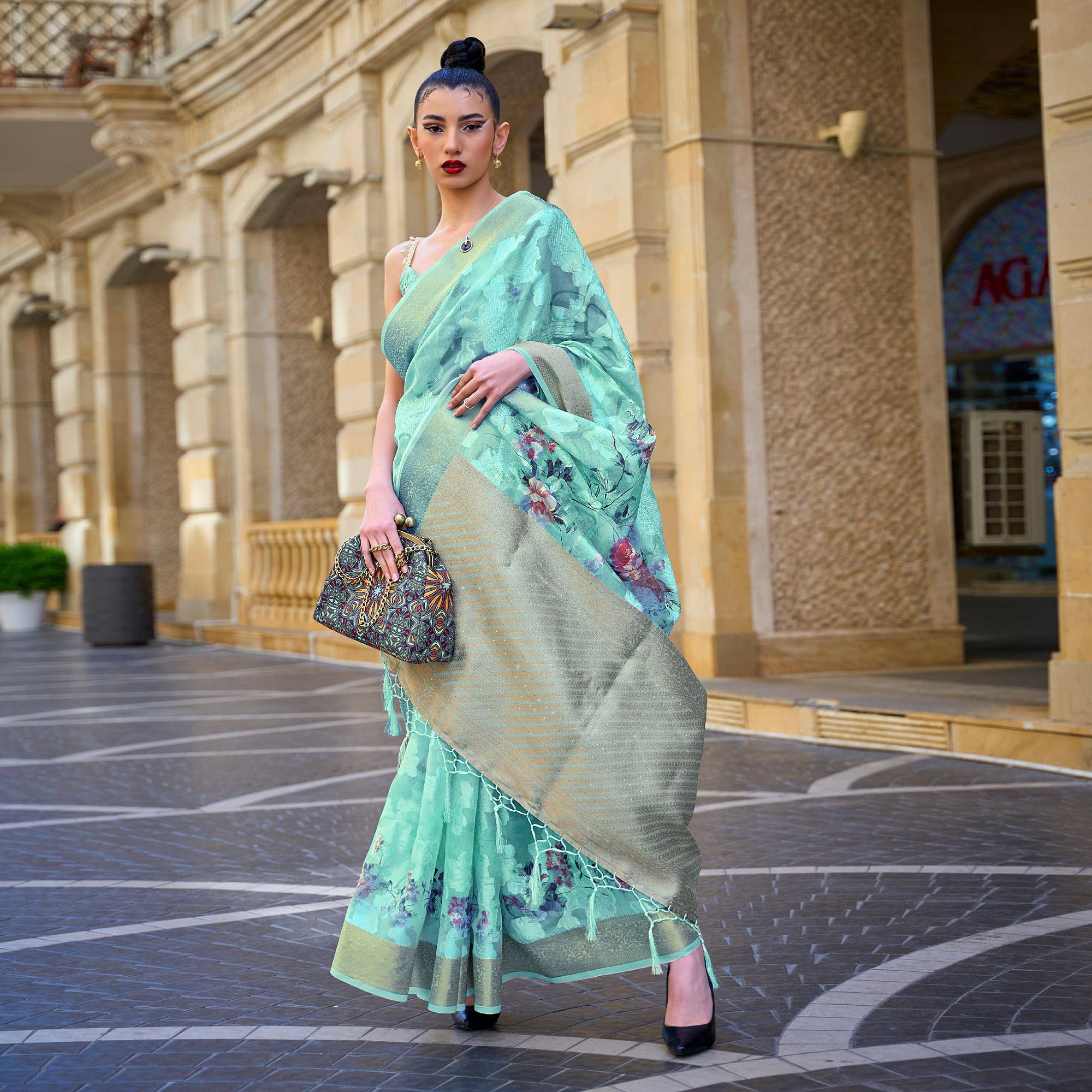Pista Green Floral Woven Brasso Saree With Tassels