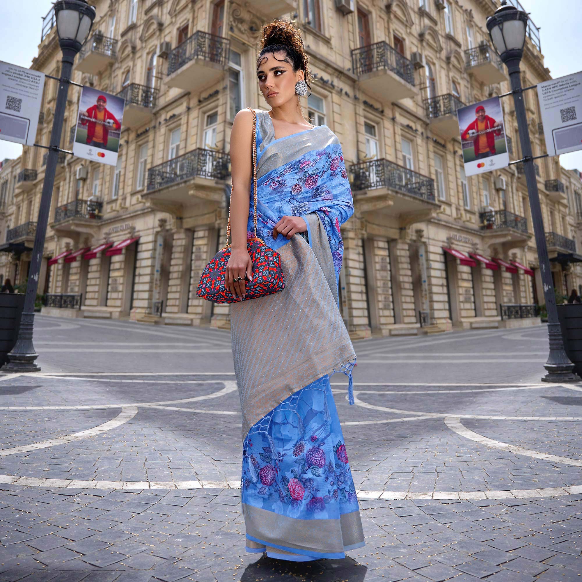 Blue Floral Woven Brasso Saree With Tassels