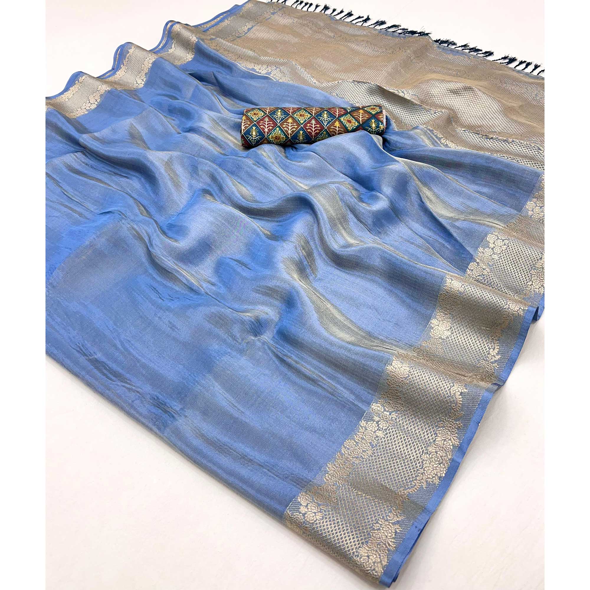 Blue Tissue Saree Adorned with Zari Weaving Border