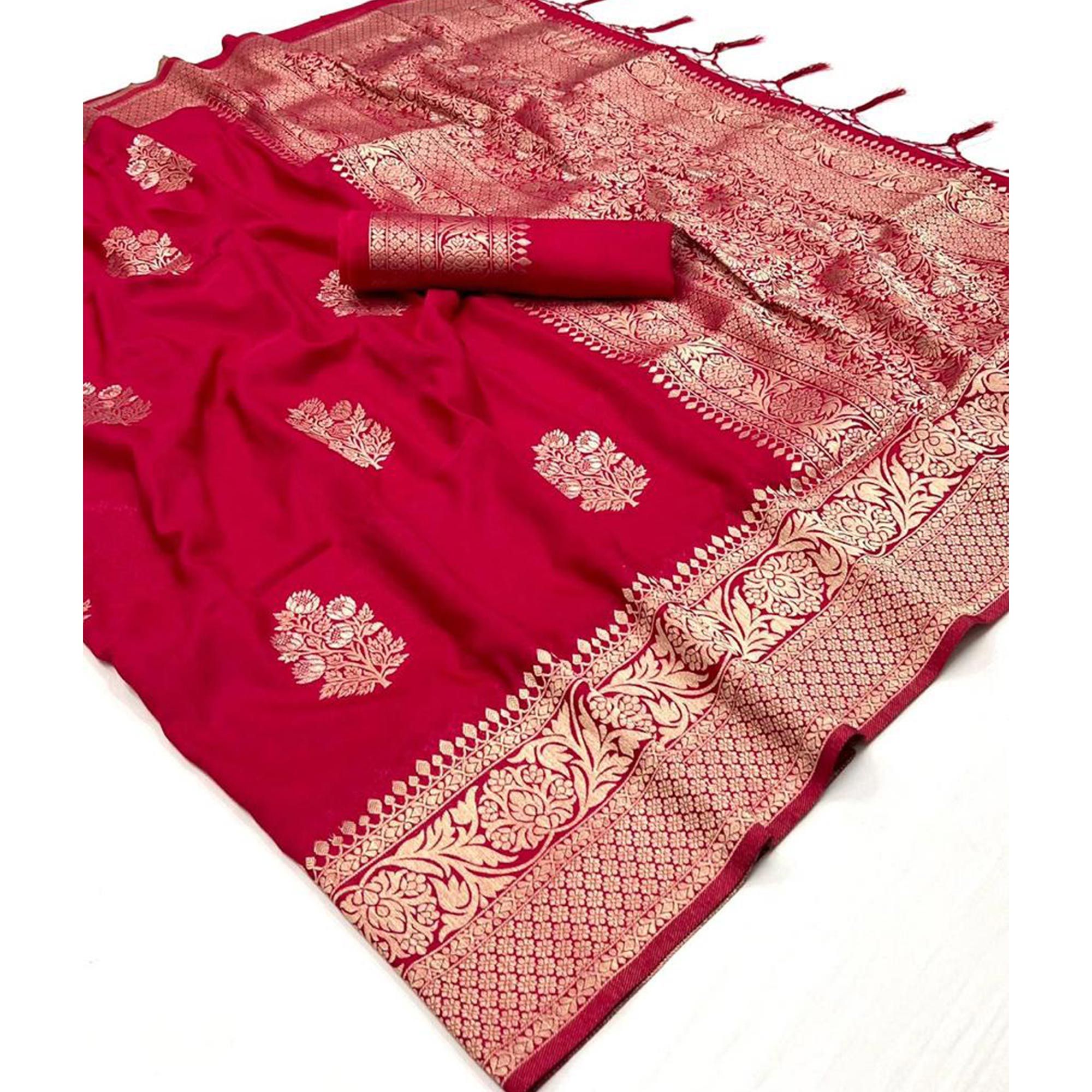 Pink Woven Georgette Saree With Tassels