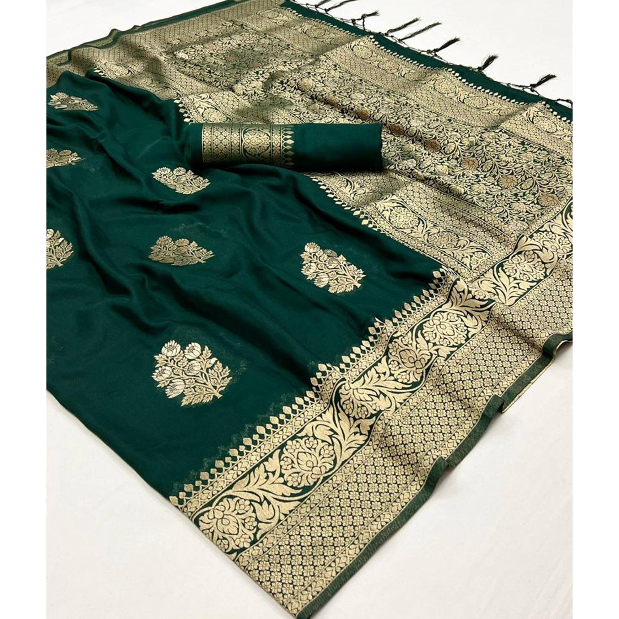 Green Woven Georgette Saree With Tassels