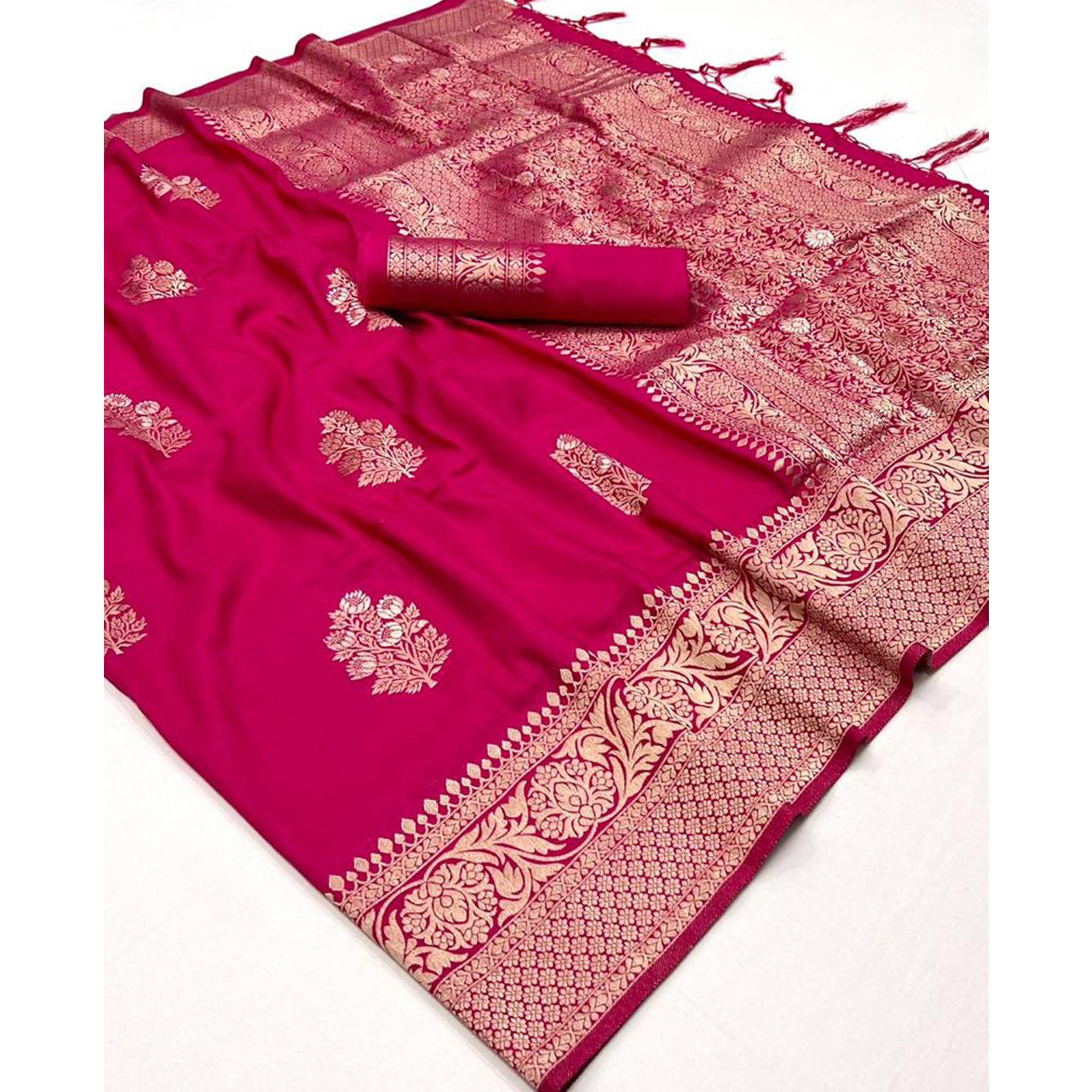 Rani Pink Woven Georgette Saree With Tassels