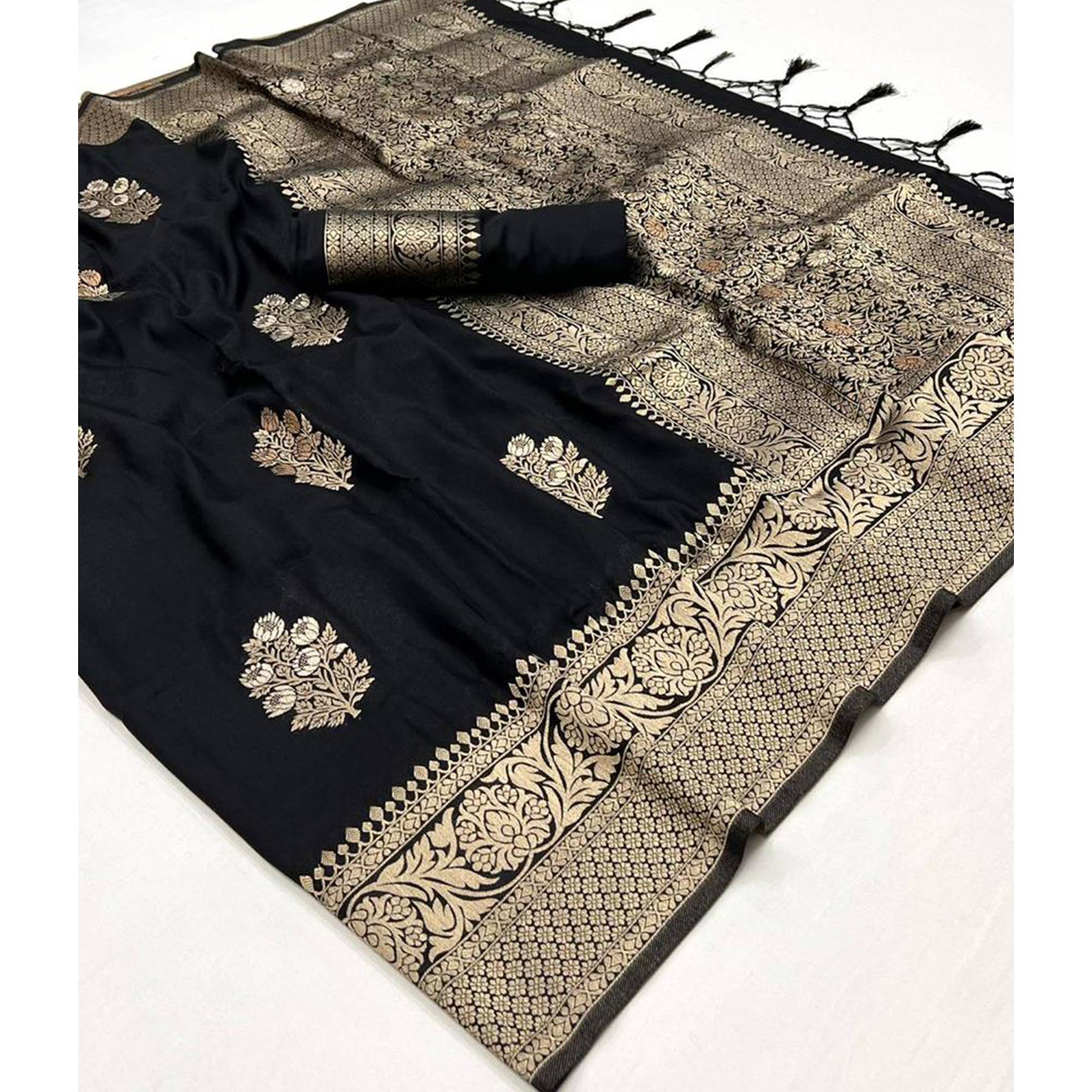 Black Woven Georgette Saree With Tassels