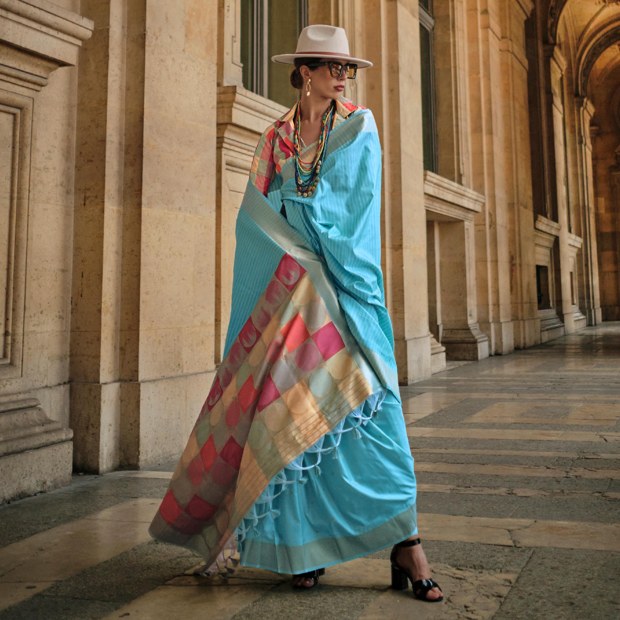 Blue Floral Woven Art Silk Saree With Tassels
