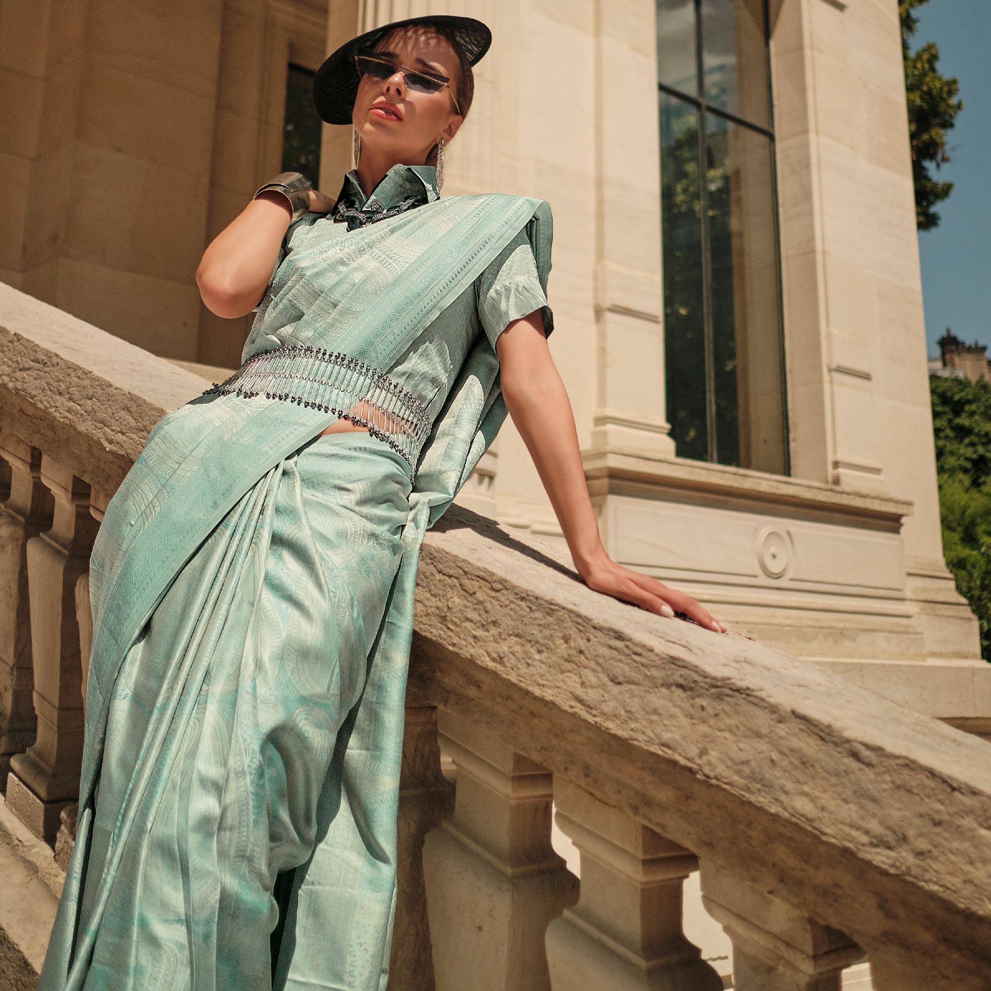 Turquoise Woven Satin Saree With Tassels