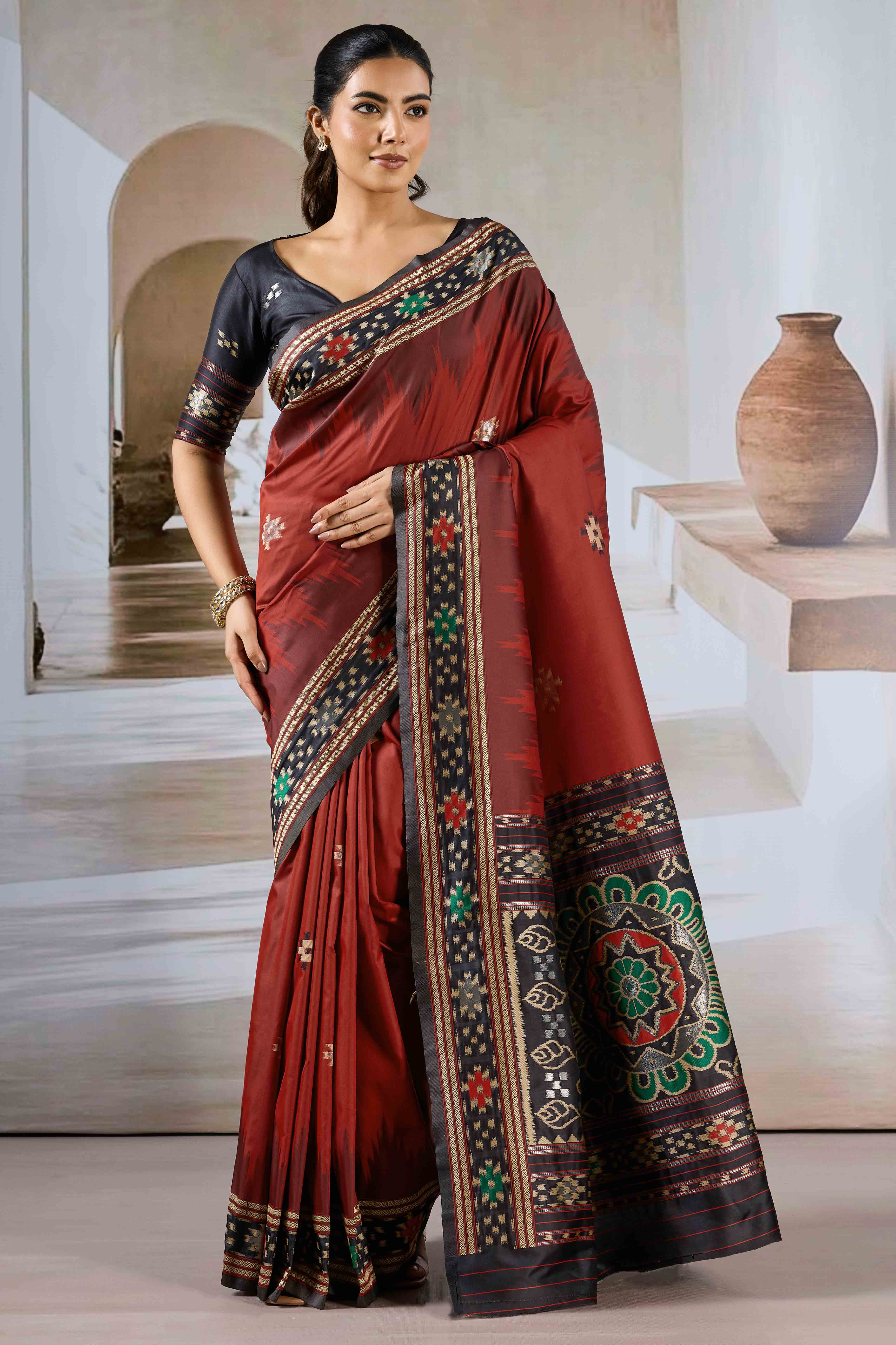 Maroon Art Silk Saree Adorned with Intricate Patola Style Woven Designs