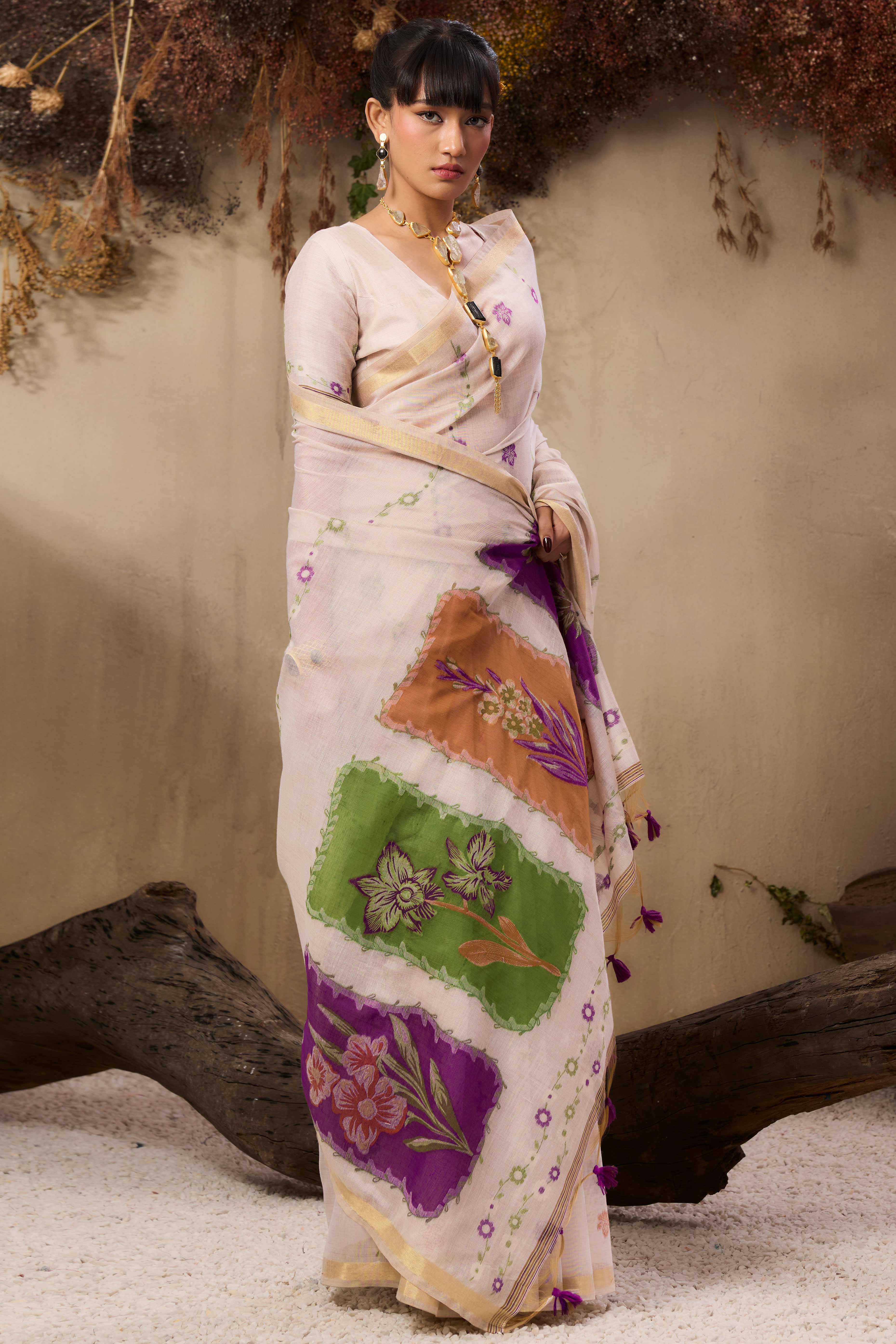 Cream Pure Munga Cotton Blend Saree Adorned with Intricate Floral Weaves