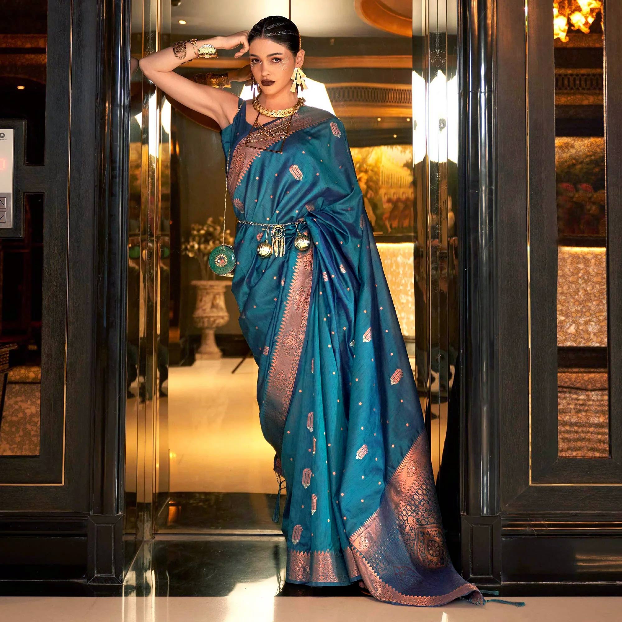 Teal Blue Woven Cotton Silk Saree With Tassels