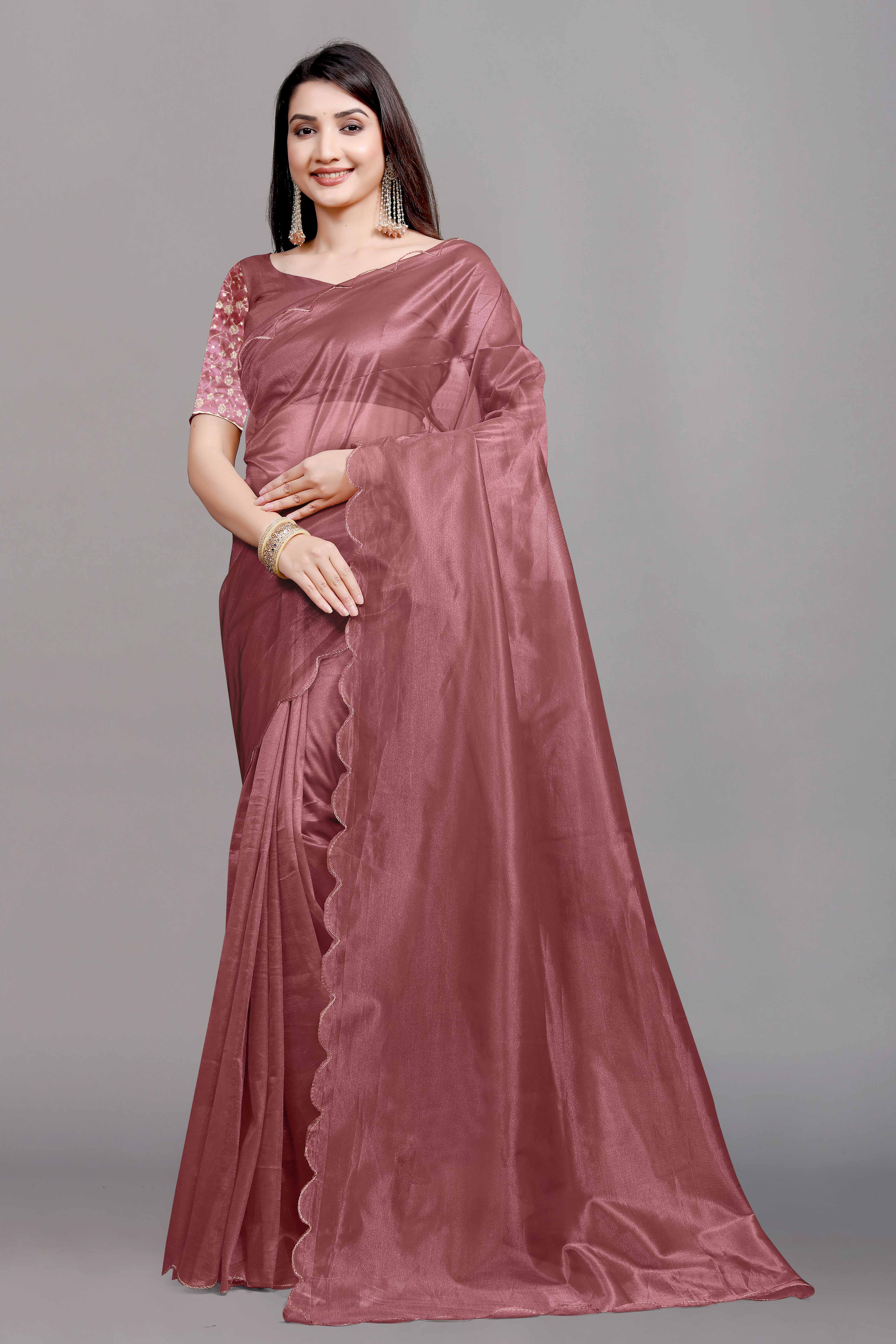 Rust Solid Net Saree With Zari Border